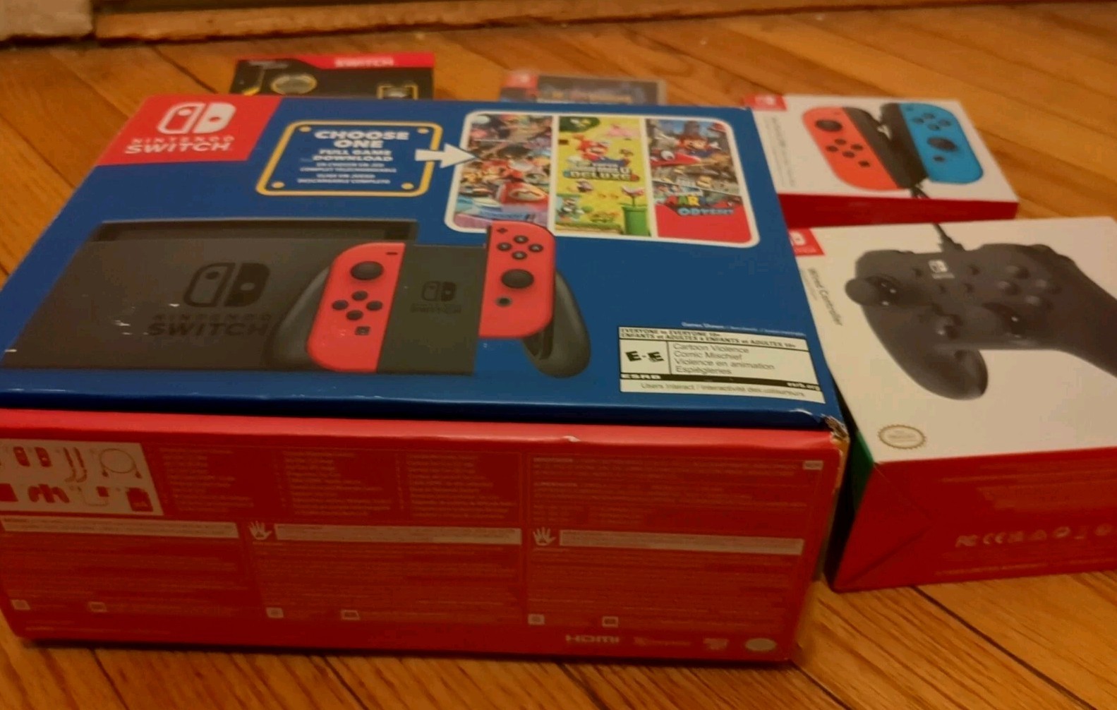 Nintendo Switch Bundle HAC-001(-01) Gaming Console – Red/Neon Blue Joy-Cons New