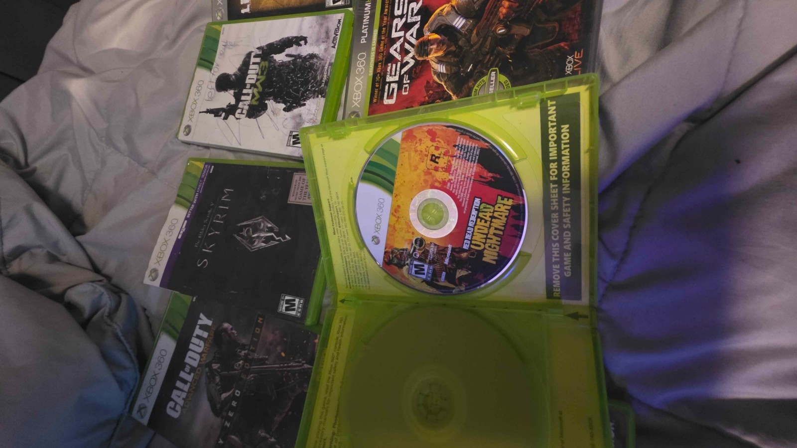 Microsoft Xbox 360 E 500GB Console with two controllers and 12 games