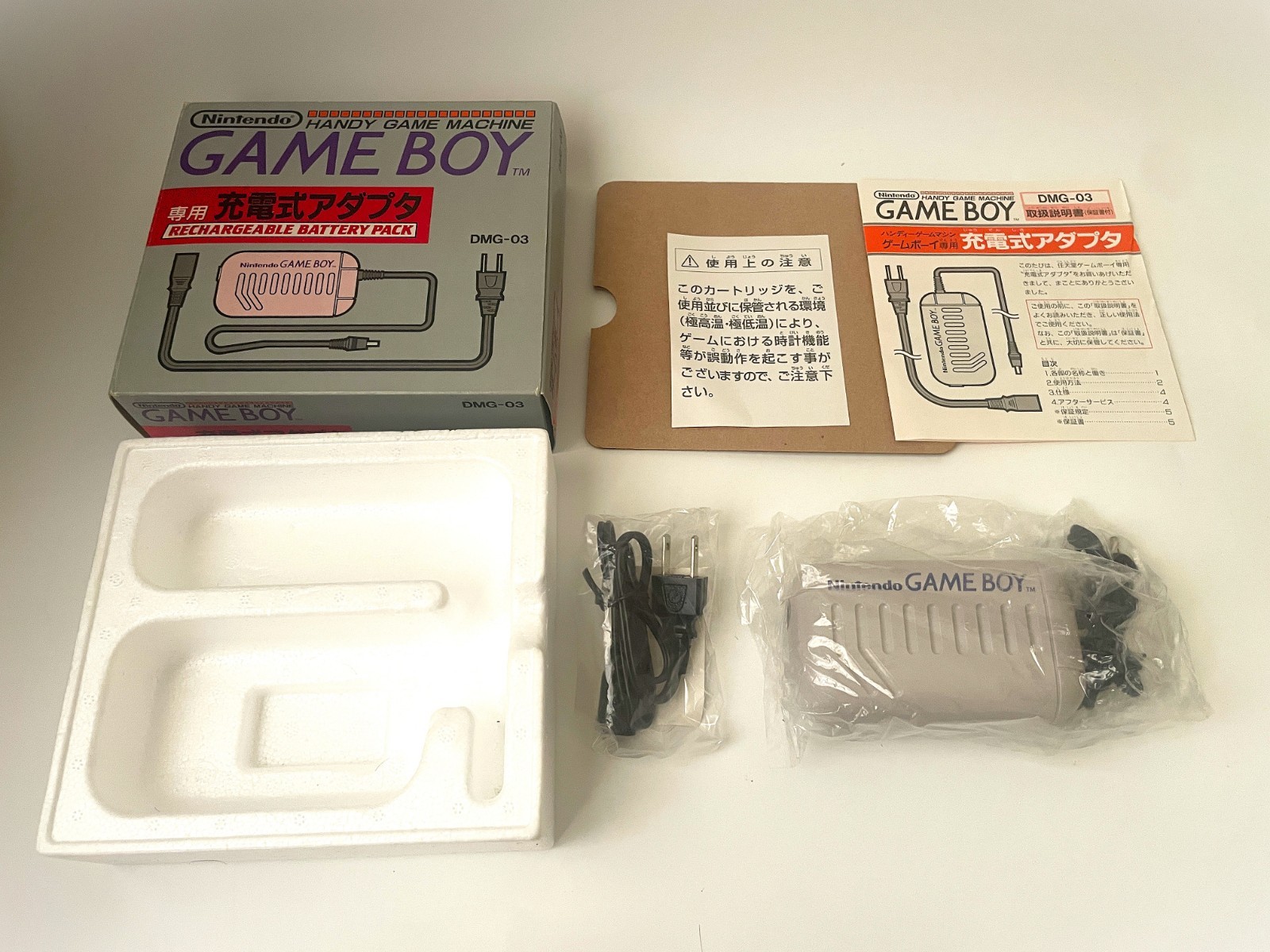 Nintendo Game Boy Console + Racing Damashii Tamagotchi Adapter Cable Bundle Set