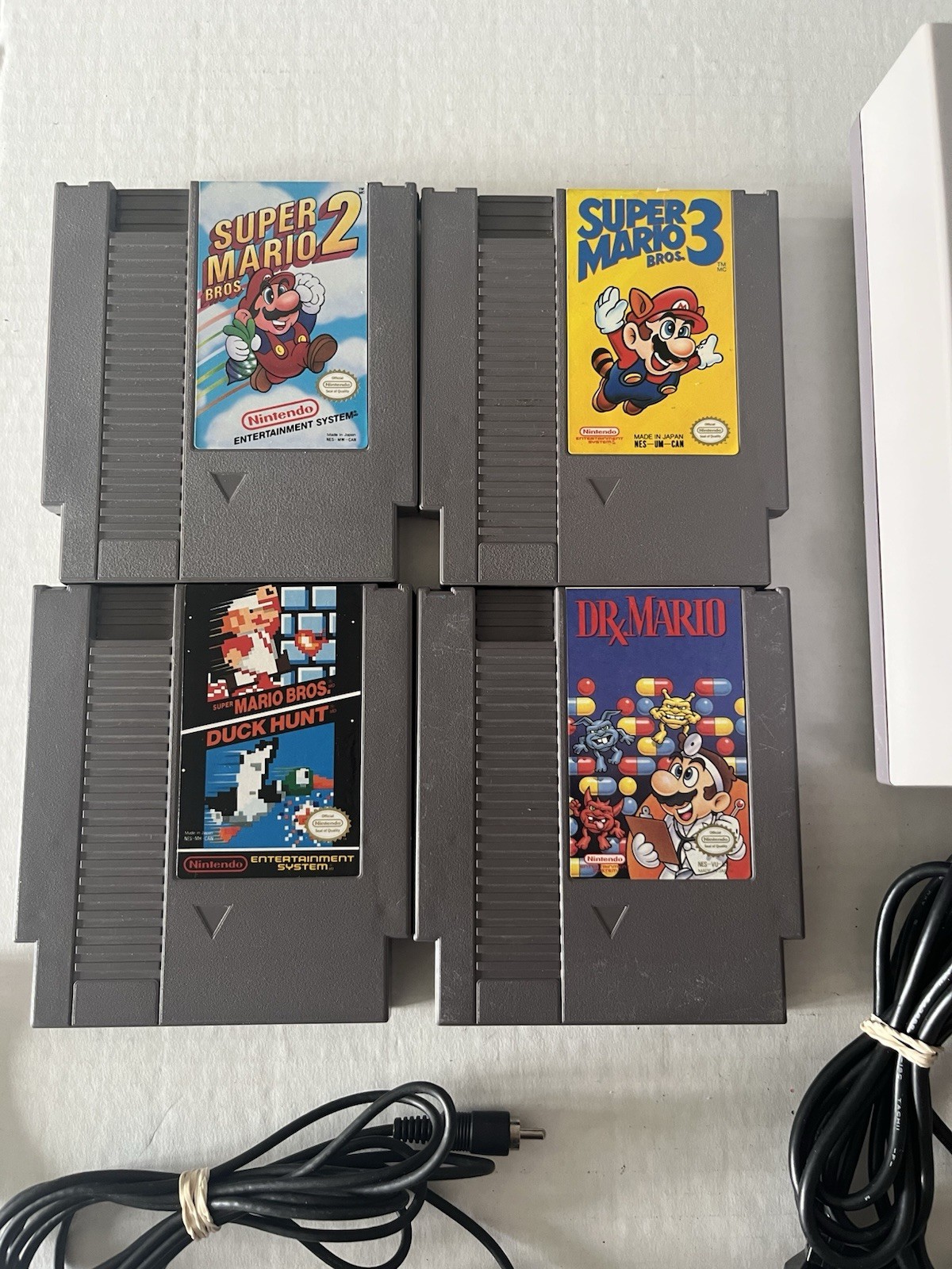 Nintendo NES Console Bundle with Super Mario Bros 1 2 3 and 2 Controllers Zapper