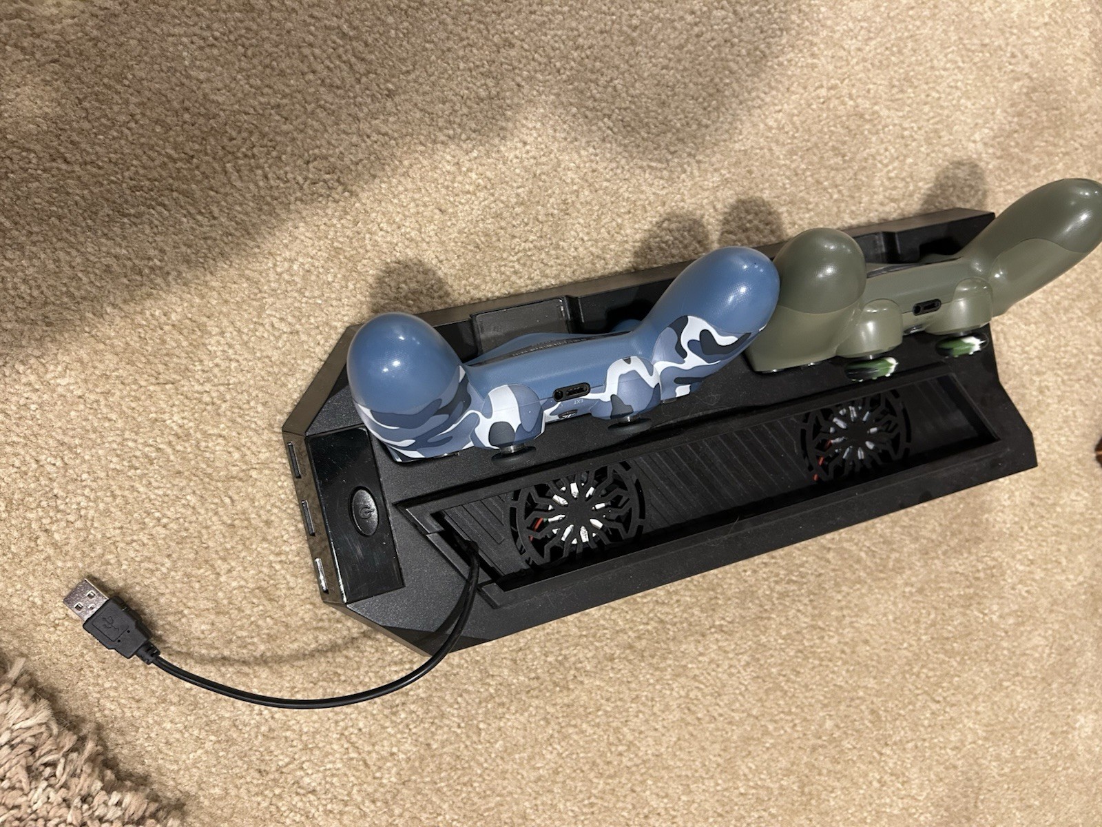 PlayStation 4 Slim with 2 controllers + charging stand/fan system and 3 games