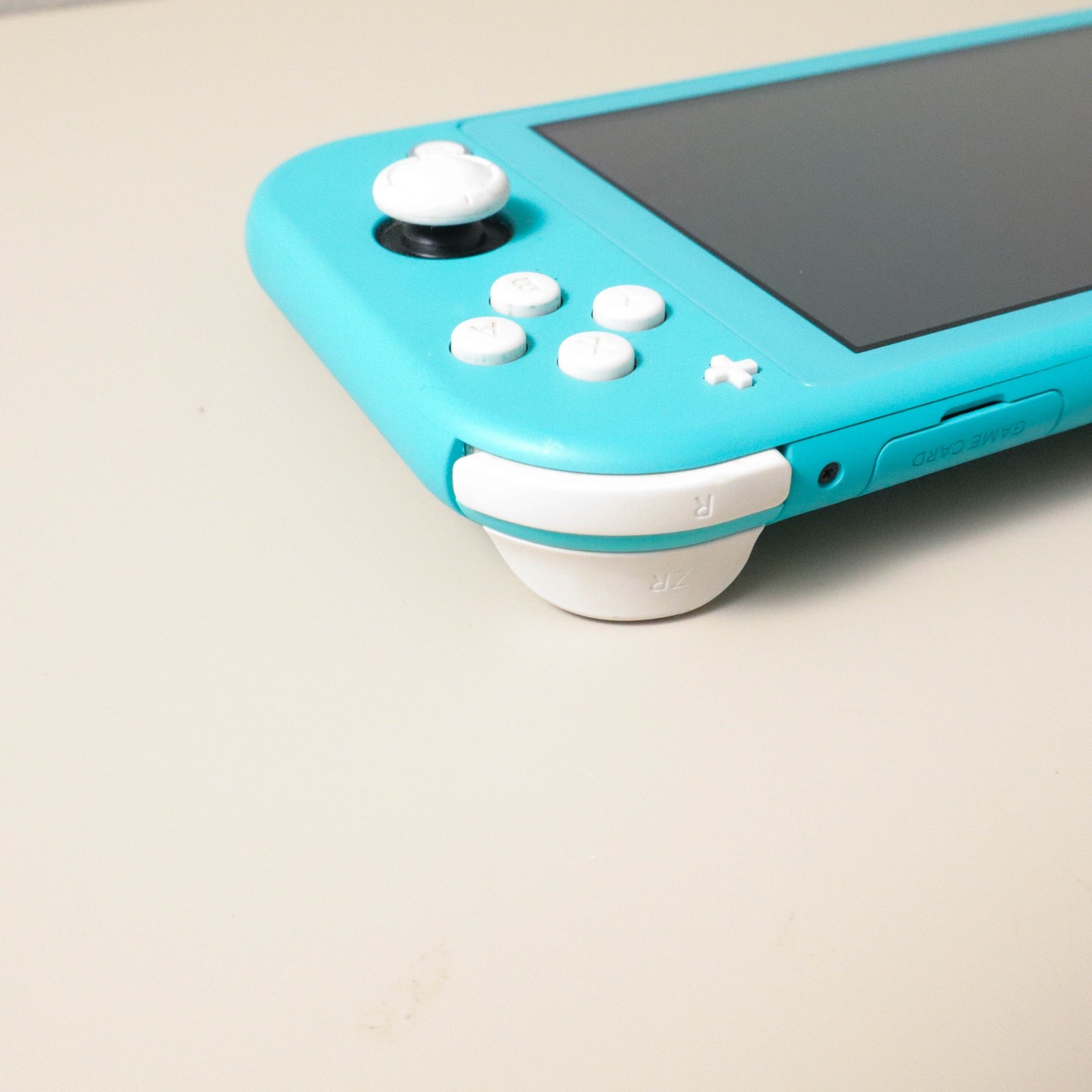 Nintendo Switch Lite Turquoise Handheld Console with Black Hard Case Gaming