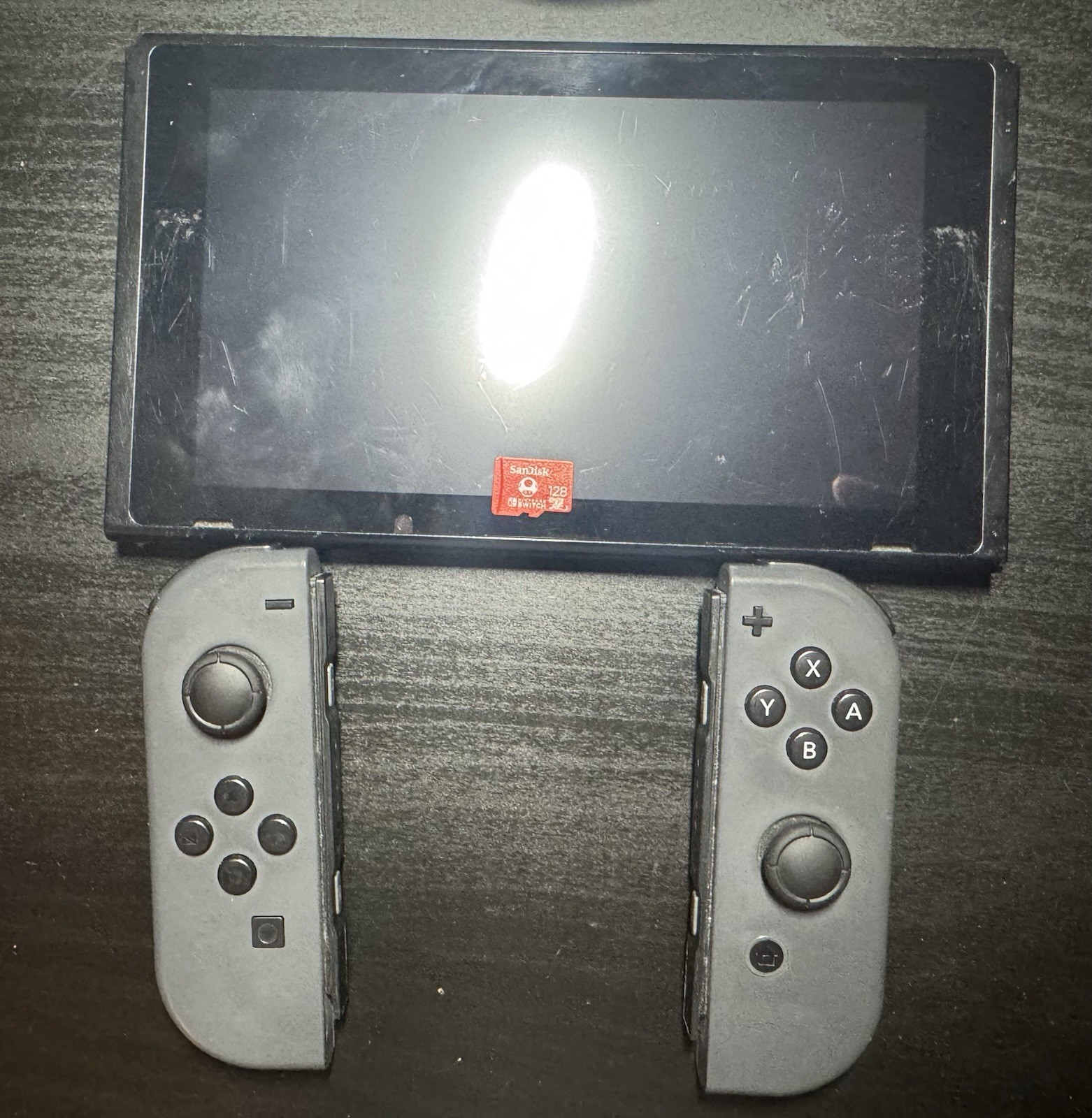 Nintendo Switch console 25.6GB with sandisk 128GB SD card