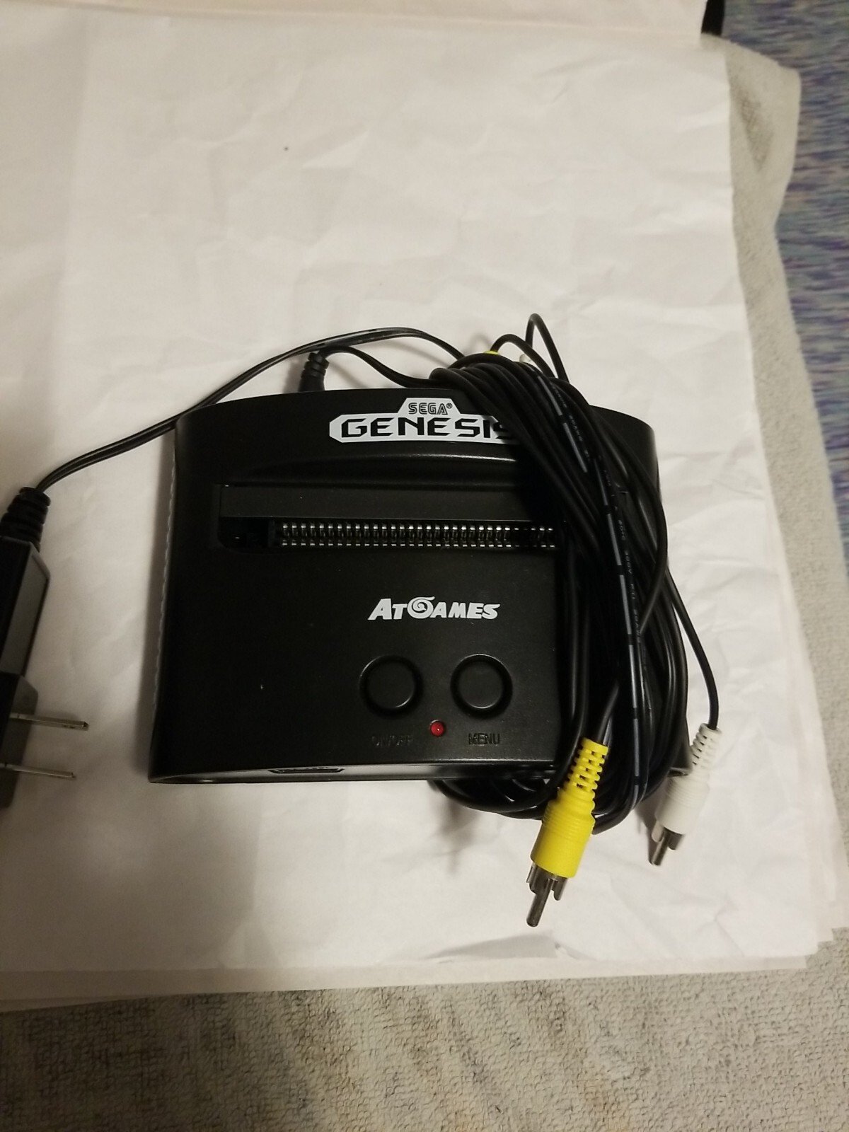 At Games Sega Genesis Classic Console With 2 controller and 40 games Built in.