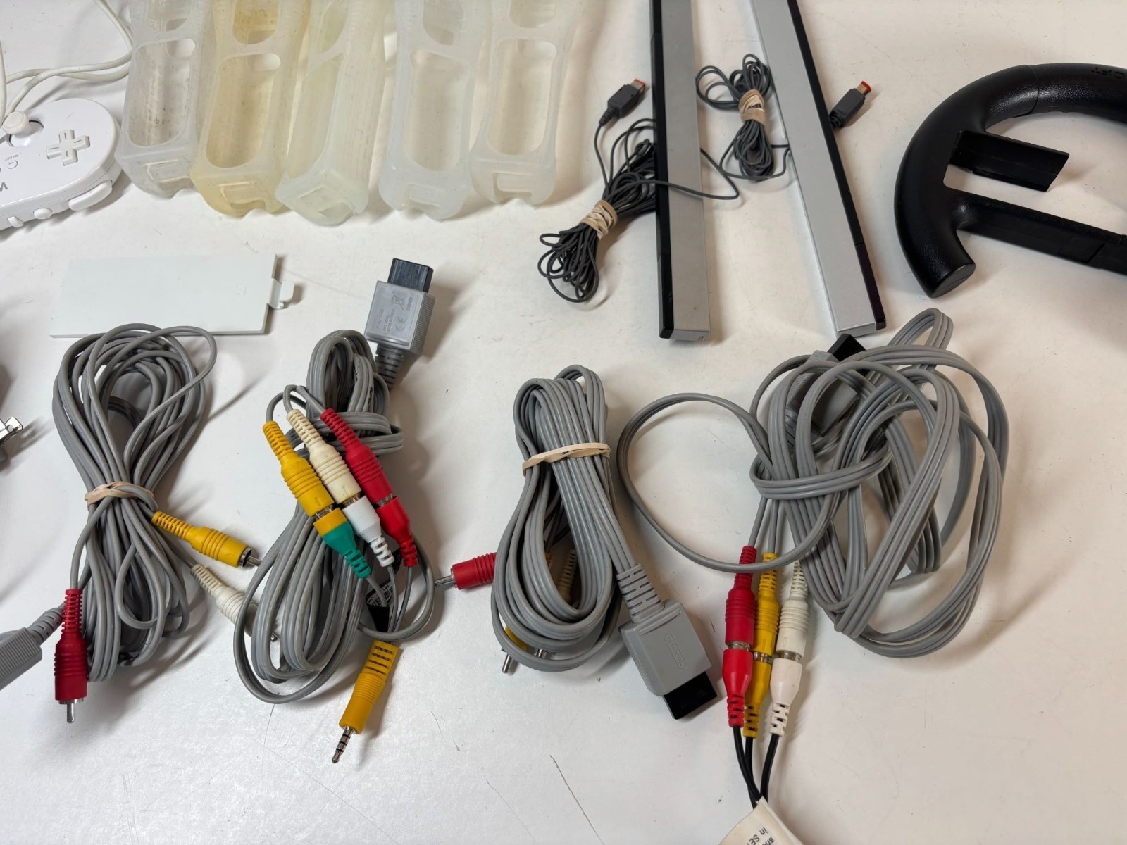 Nintendo Wii Controllers & Accessories Bundle With Cables Sensor Bars & Wheel