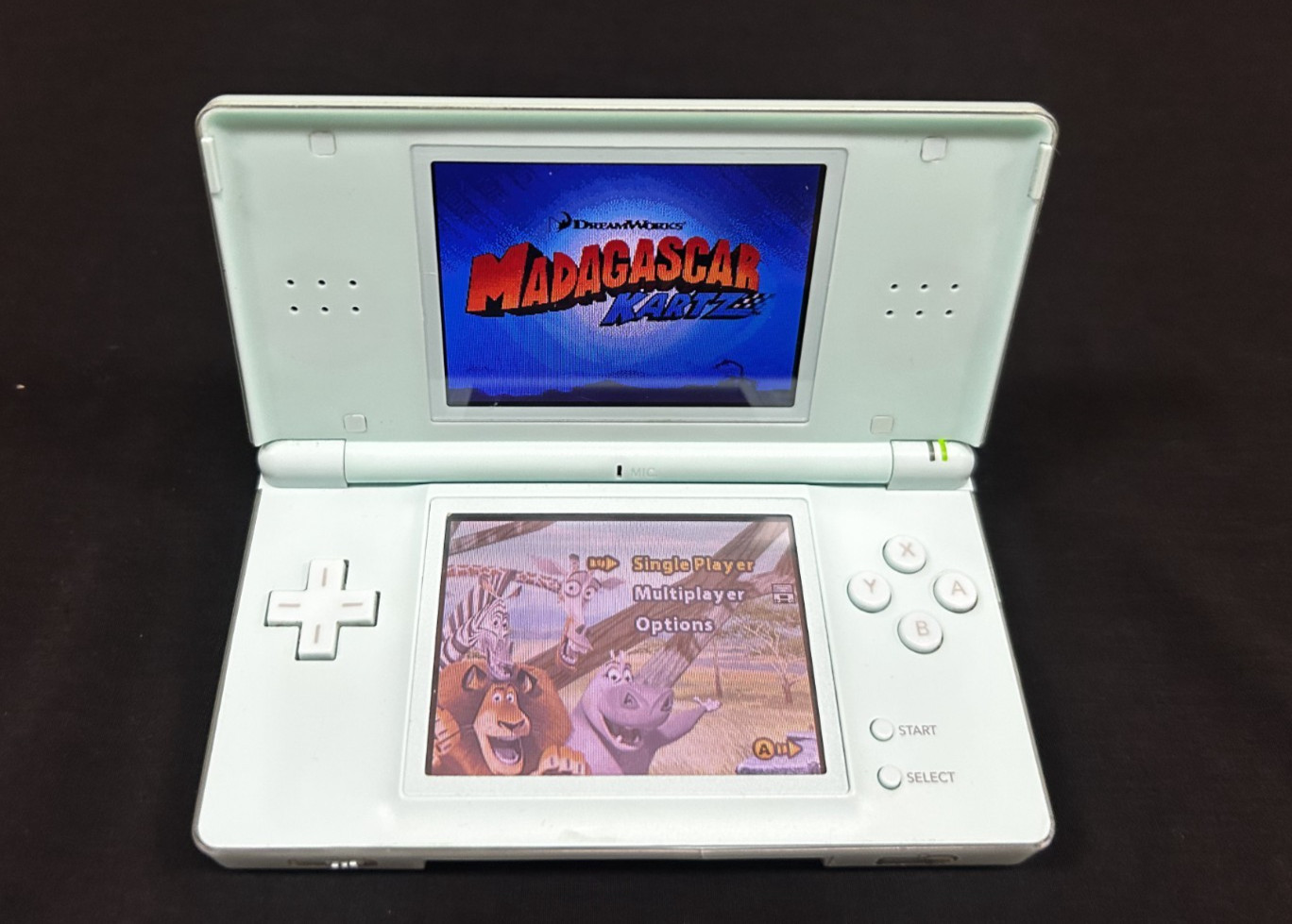 Nintendo DS Lite Light Blue – W/ Charger & Stylus