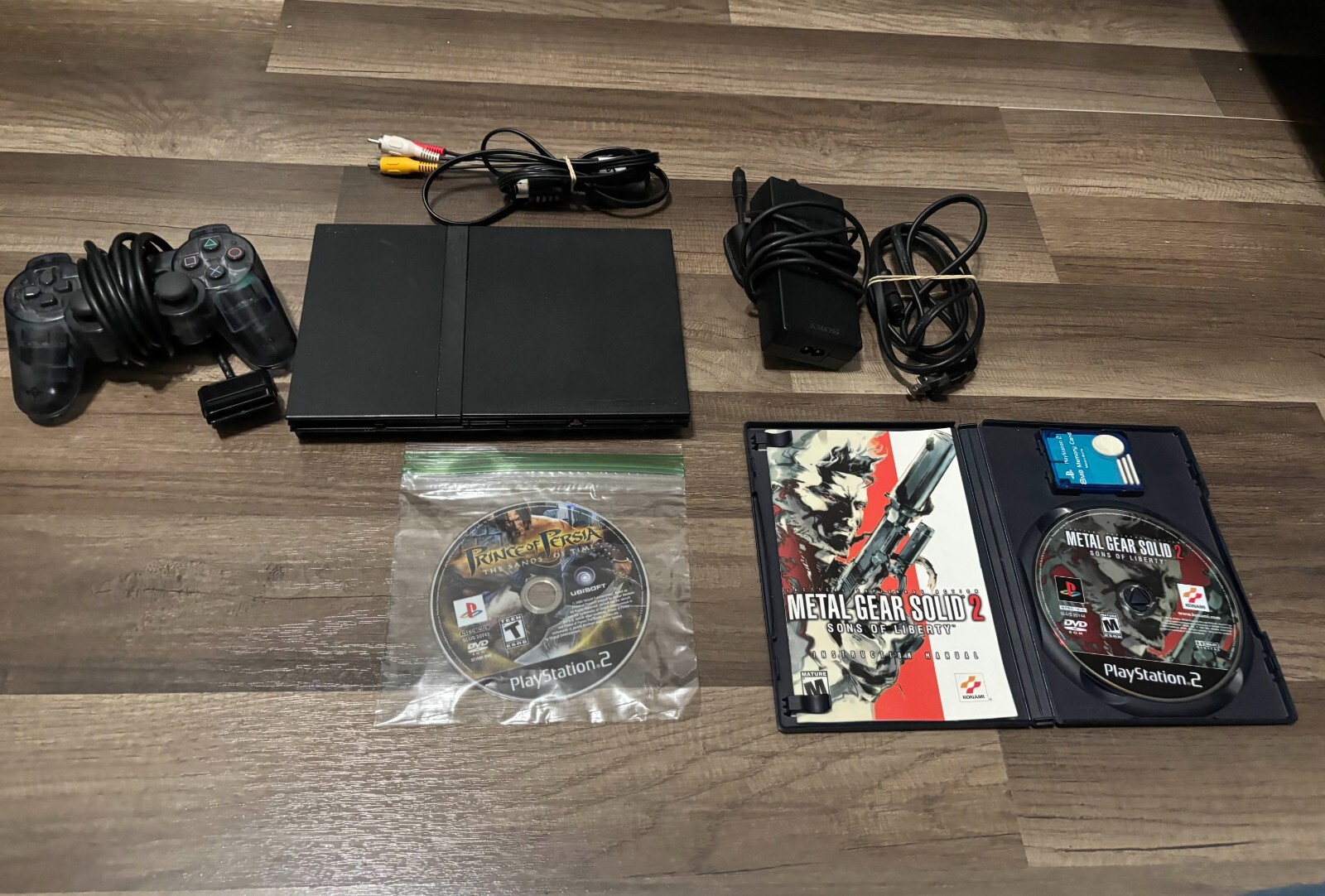 Sony Playstation 2 Slim COMPLETE with Metal Gear Solid 2 and Prince of Persia