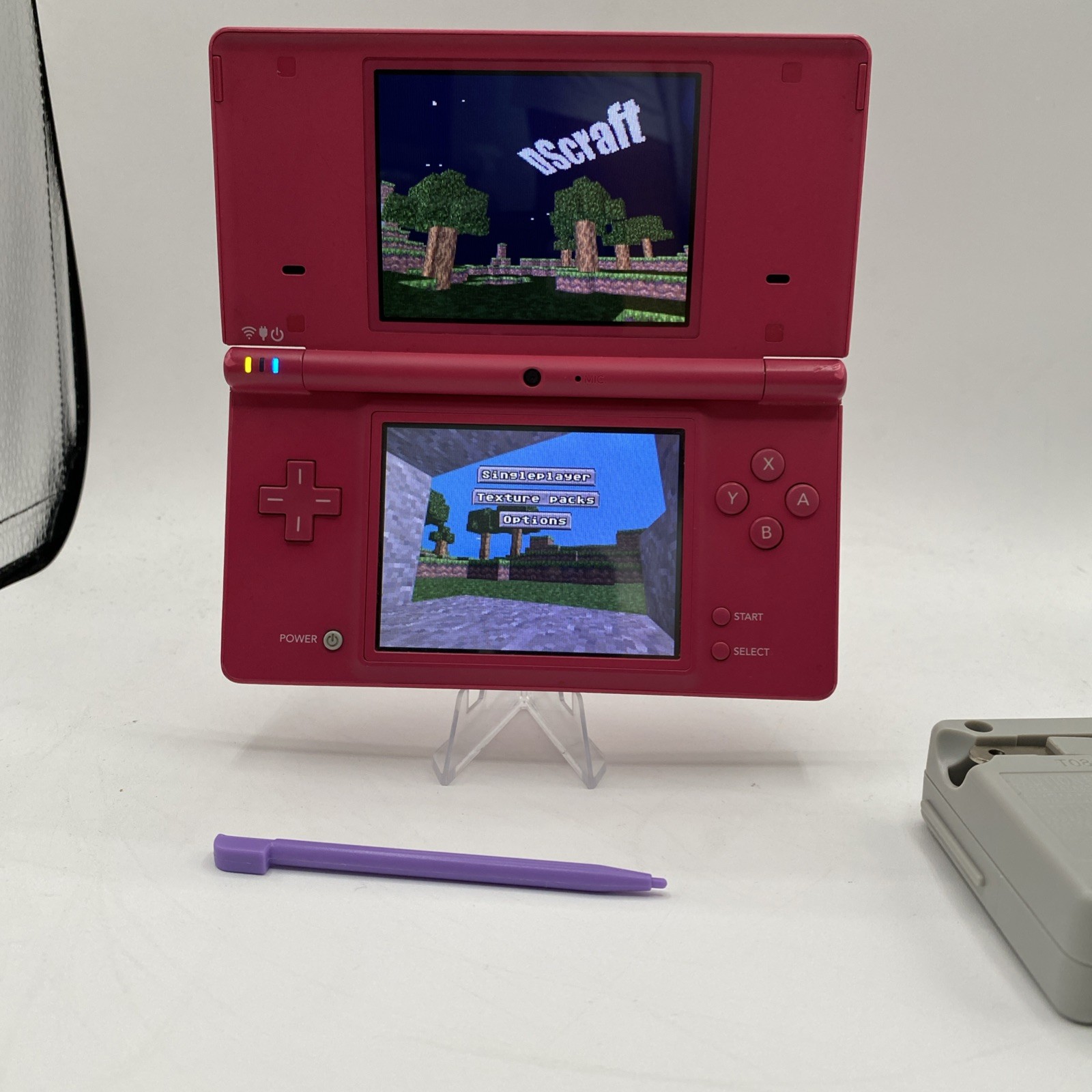 Nintendo DSi Hot Pink – Includes Preloaded Library (Large Collection)