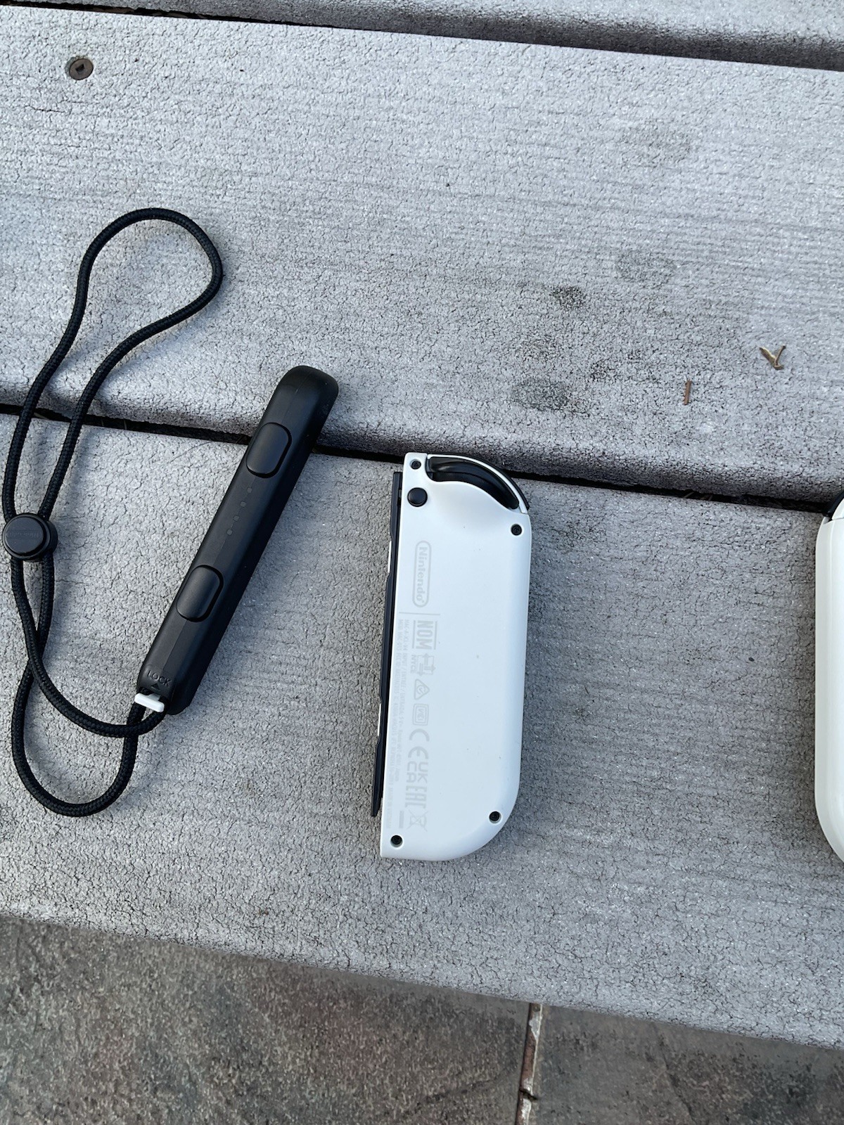 White Joycons with Straps And Grip. OLED White Nintendo Joycons