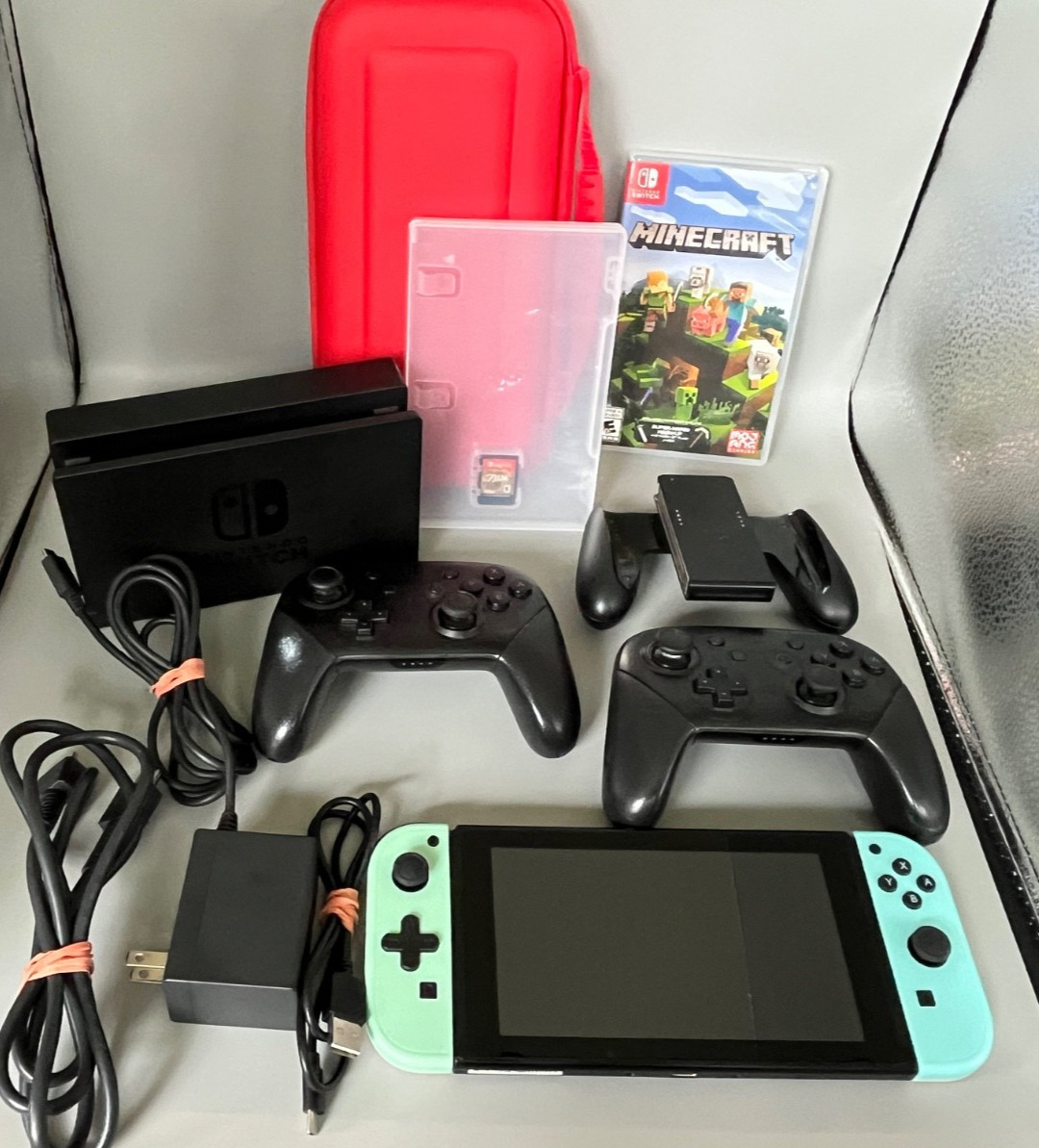 Nintendo Switch Bundle w Pastel Green Blue Joycon 2 controllers 2 games Case