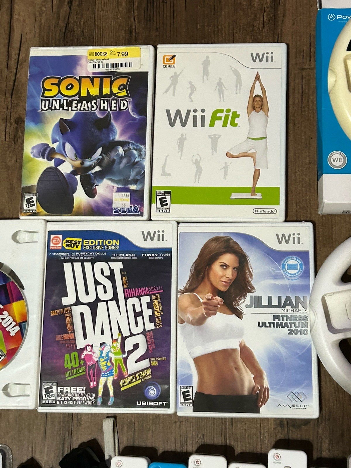 Huge Nintendo Wii Accessory Bundle,Remotes, MotionPlus,Wheels, Sports Pack,Games