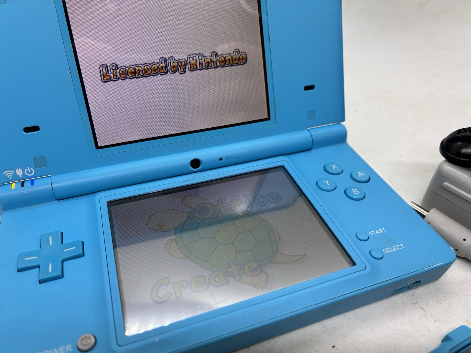 Nintendo DSi Blue Handheld Console (READ). Tested With Stylus, Earbuds Charger
