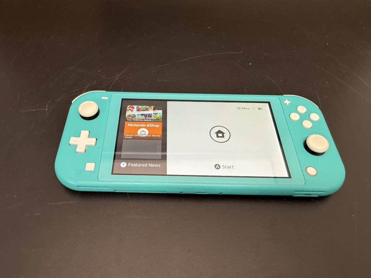 Nintendo Switch Lite 32GB Handheld Console – Compact Design, Built-I (A1D027231)