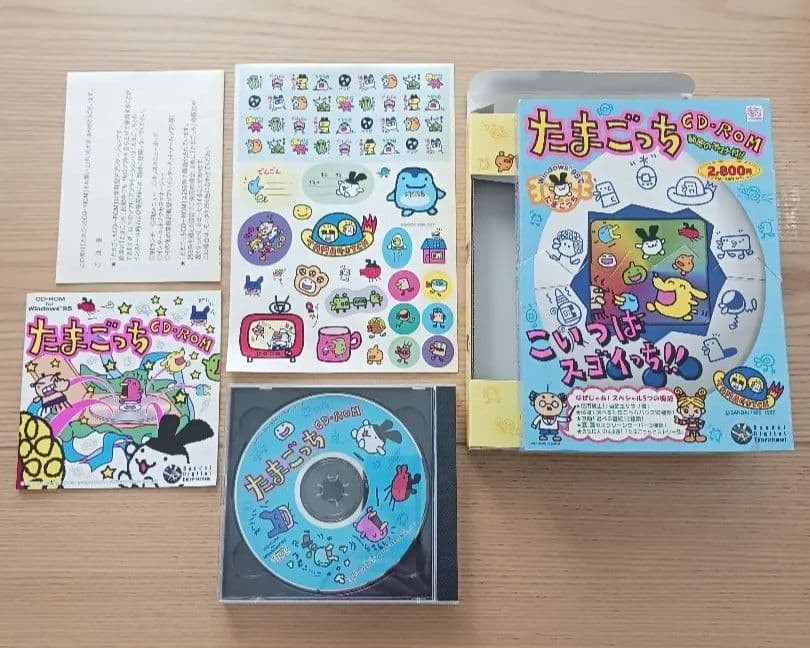 Retro Windows 95 Tamagotchi CD-ROM with Sticker – Rare PC Game