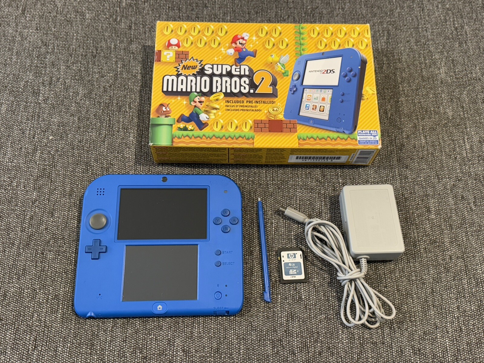 Nintendo 2DS New Super Mario Bros 2 – Electric Blue w/Box, OEM Stylus & Adapter