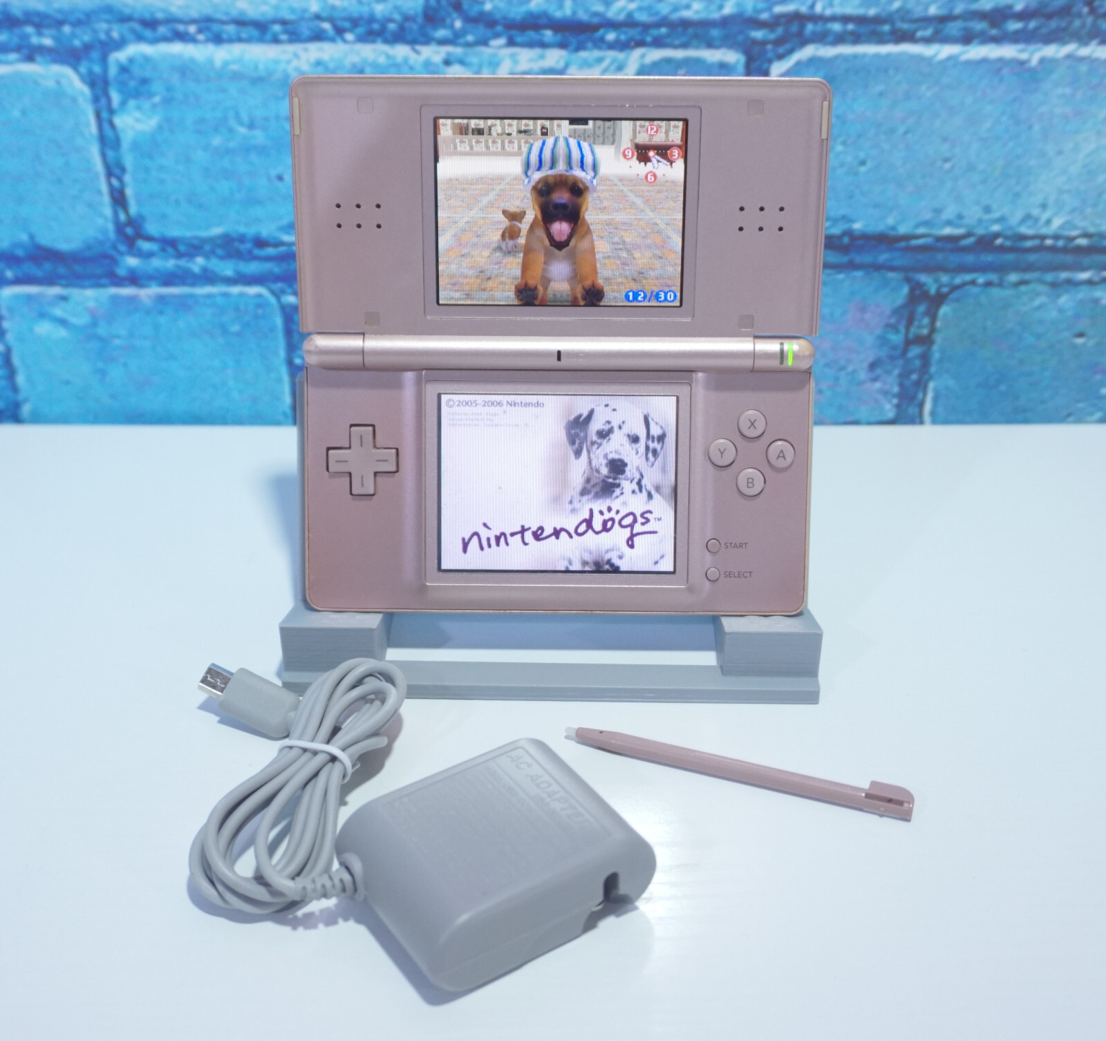 Nintendo DS Lite Metallic Pink Handheld Gaming System with Charger and Stylus