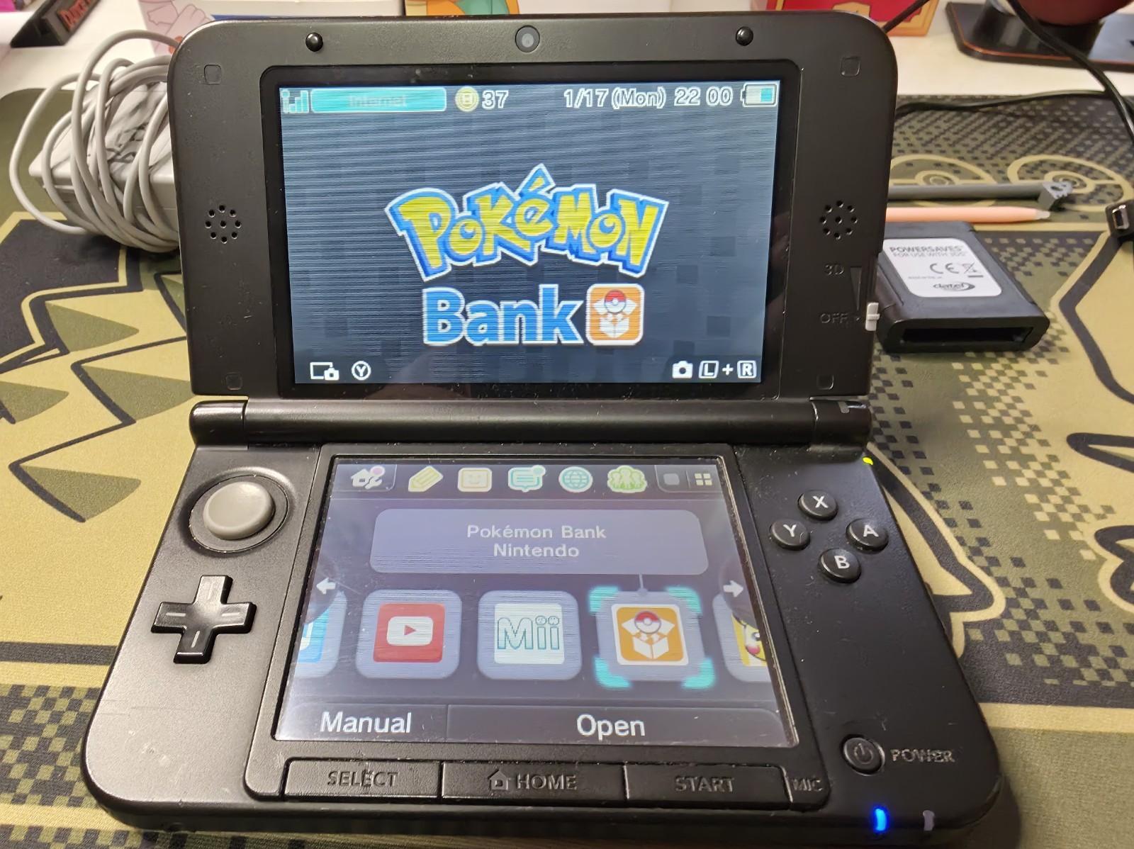 Nintendo 3DS XL Blue/Red With Multiple Pokemon Games.