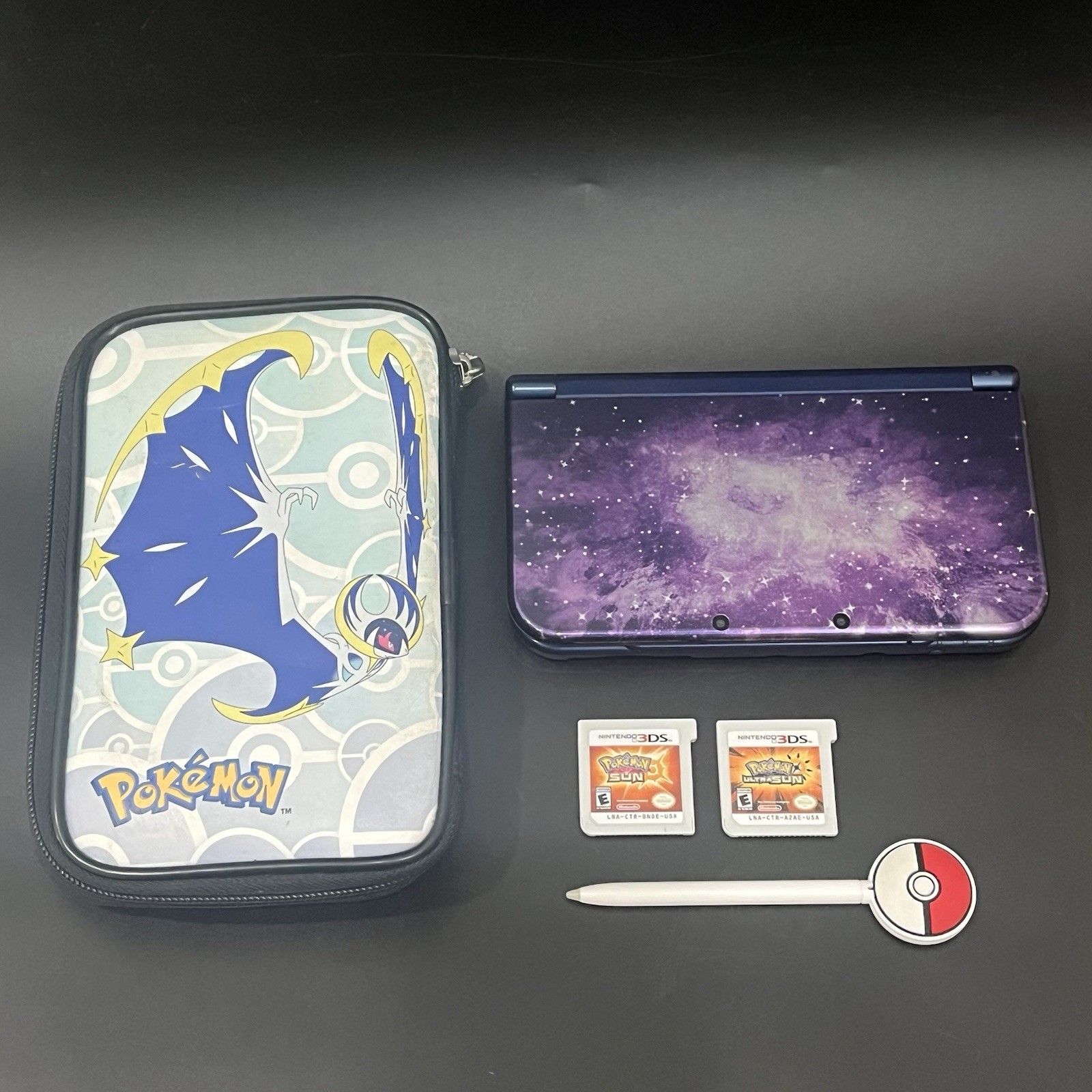 Nintendo 3DS XL Galaxy Edition Handheld System w/ Pokémon Sun Cart Games – Works
