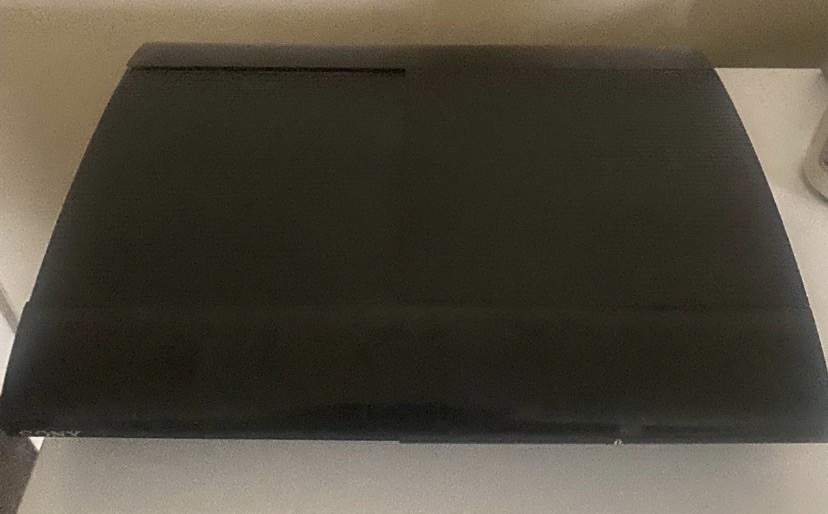 PlayStation 3 Super Slim And Sixaxis Controller (read description)