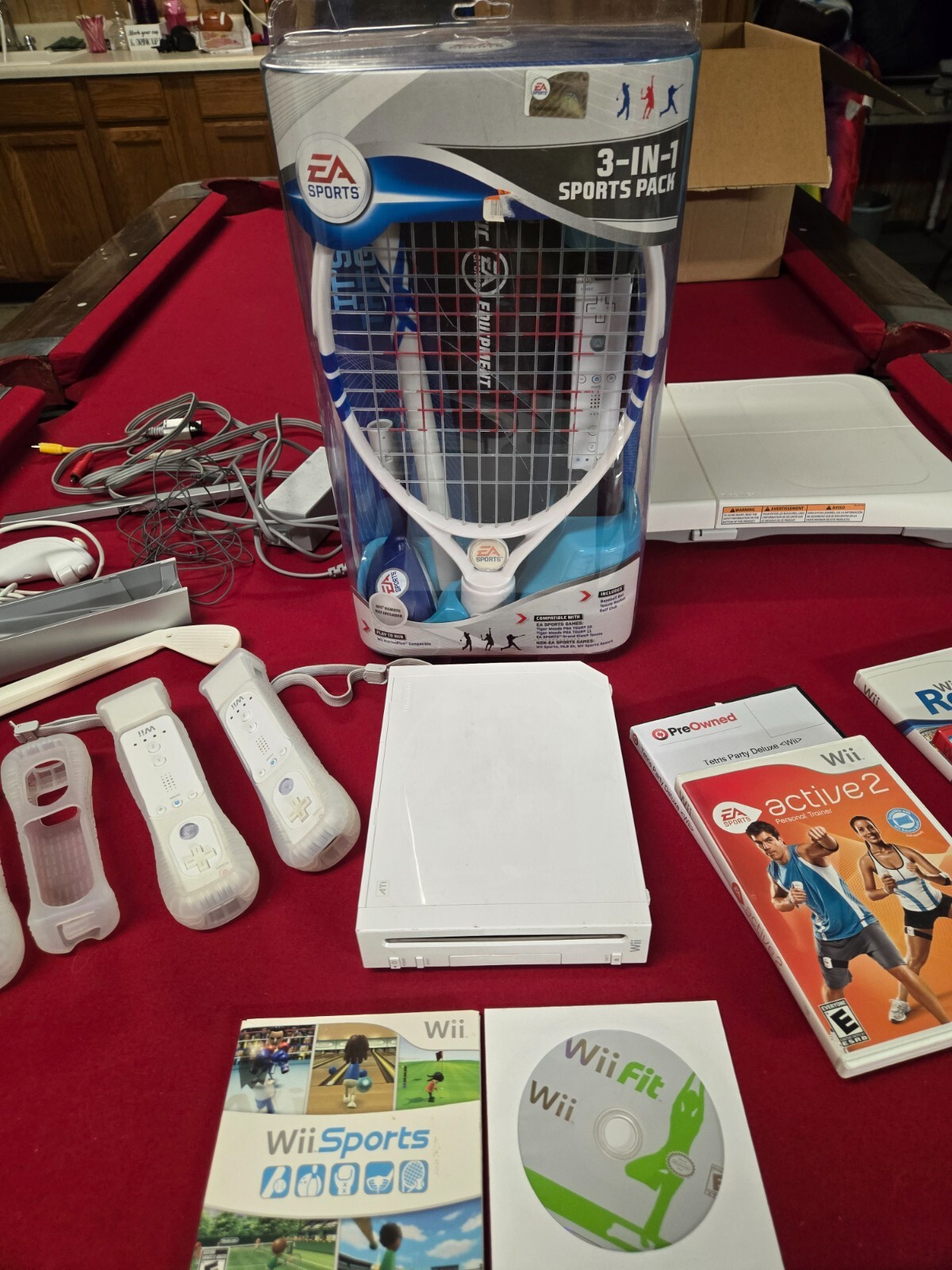 wii console bundle with games, 3n1 sports pack, and Balance Board