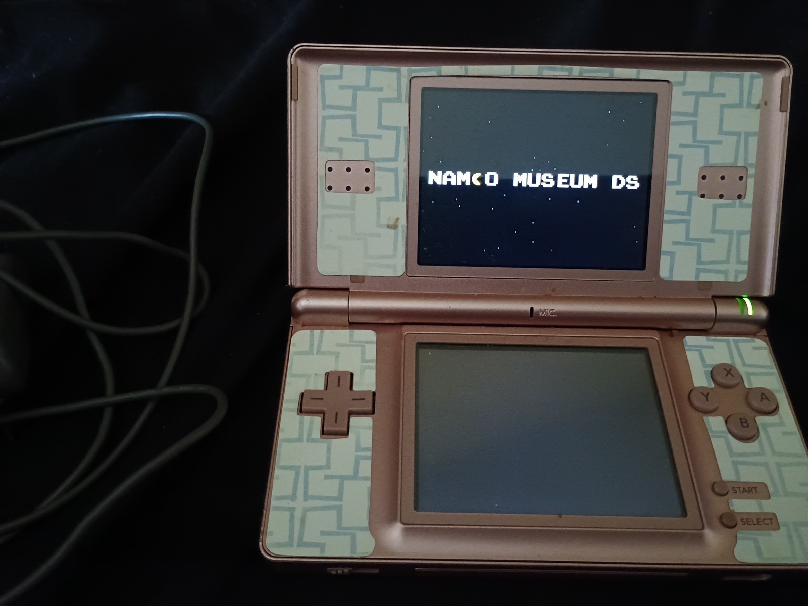 Nintendo DS Lite Handheld Console and Wall Charger – Metallic Rose.