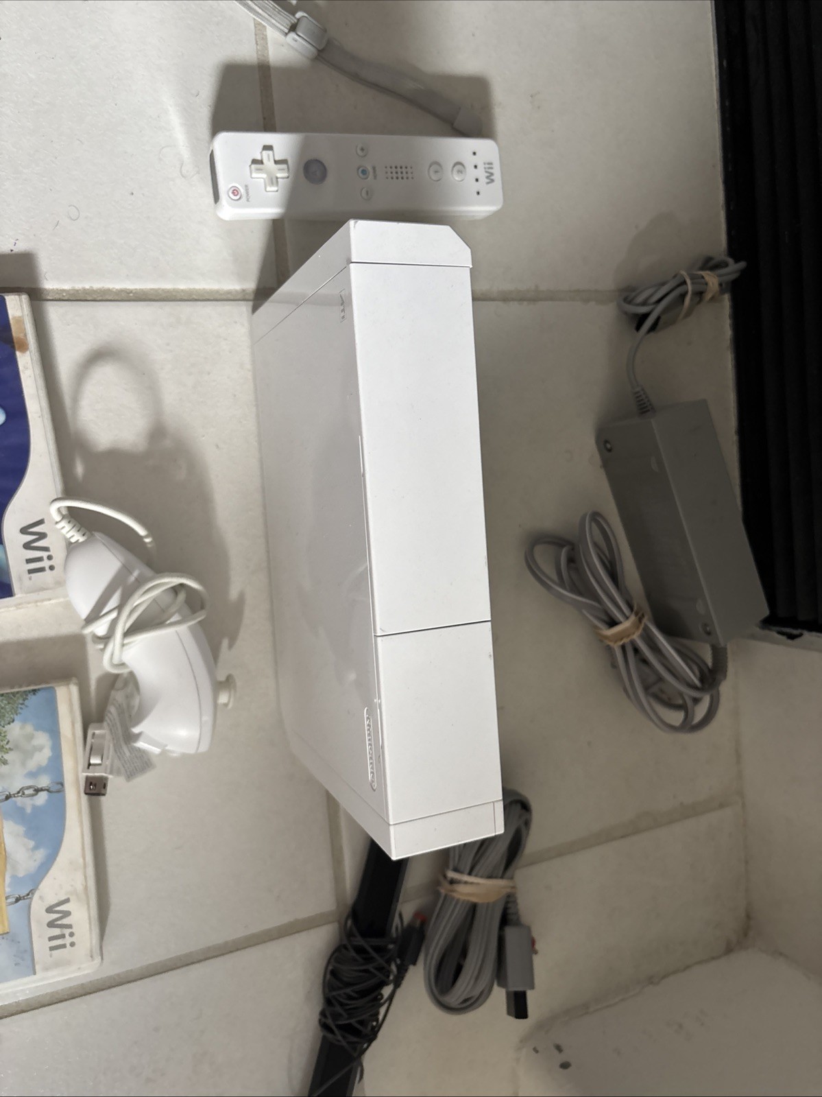 Wii Console With Single Controller And Two Games With Steering Wheel