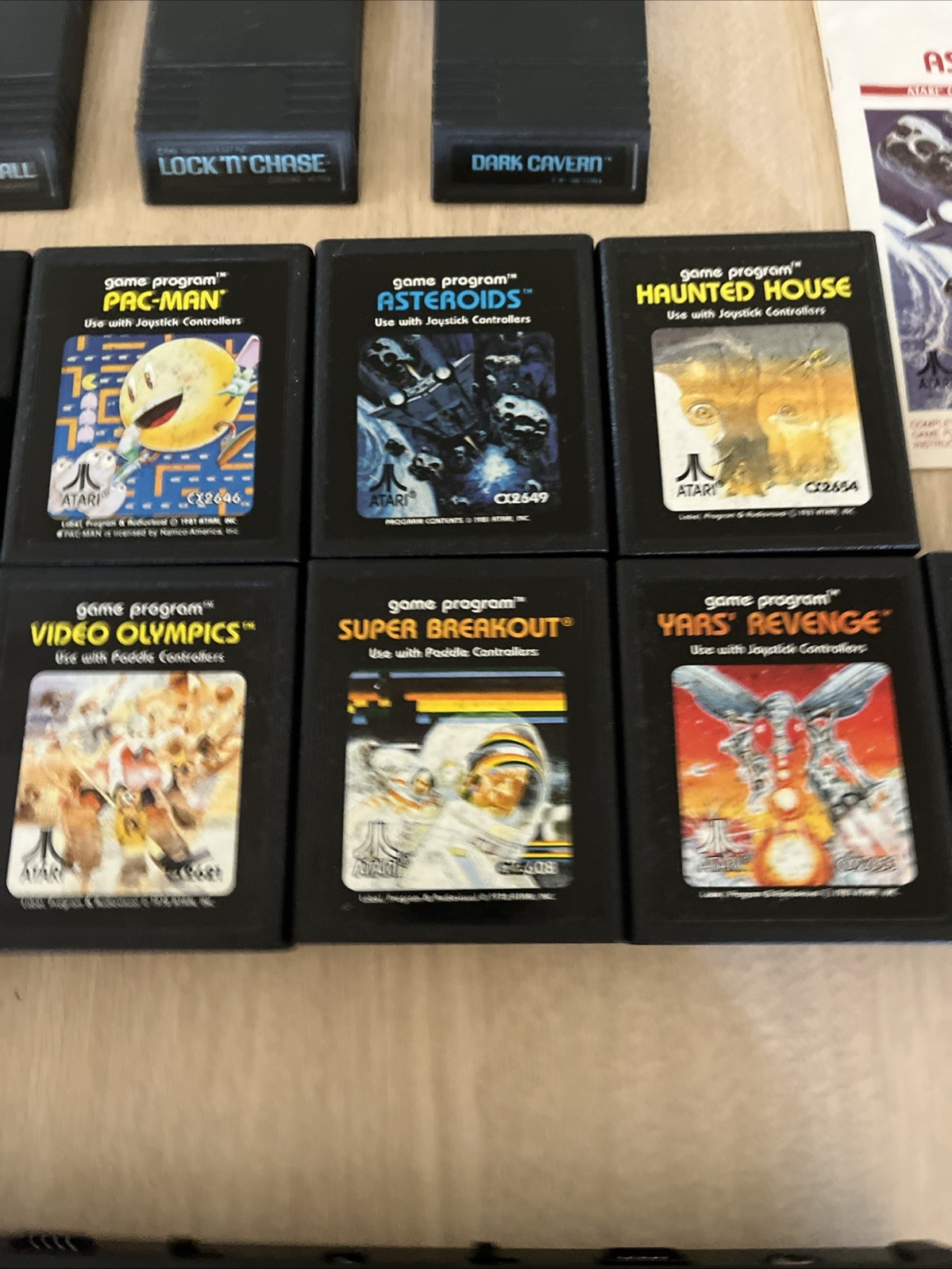 Atari 2600 Bundle – 12 Games (All with Manuals) And Controllers + Paddles Q33