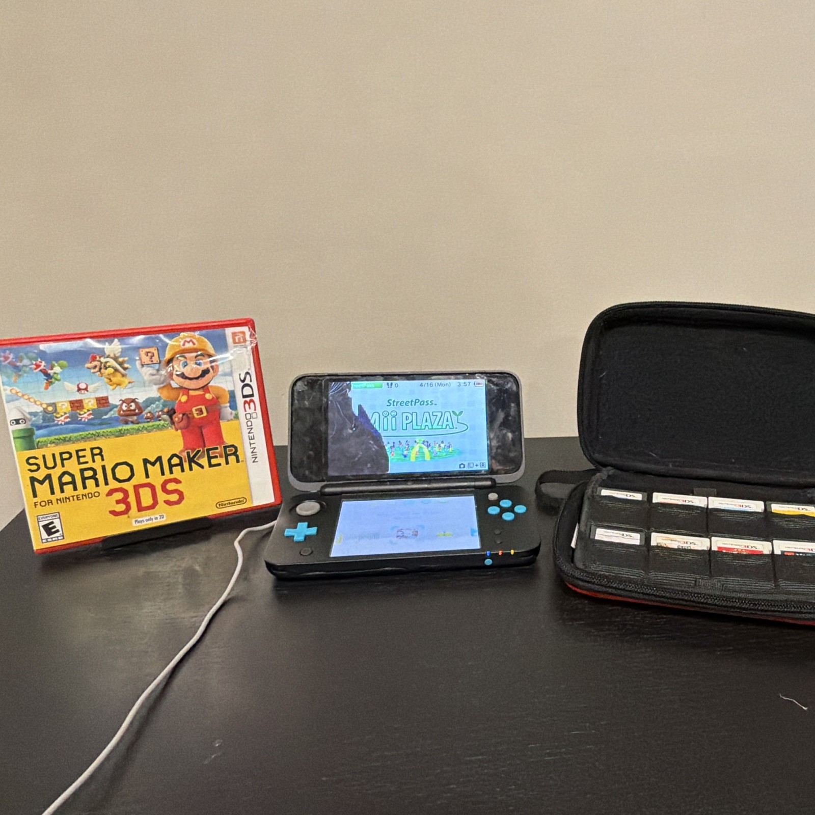 Nintendo 2DS XL Black/Blue Handheld System w/ 9 Games Case Black Ink Crack
