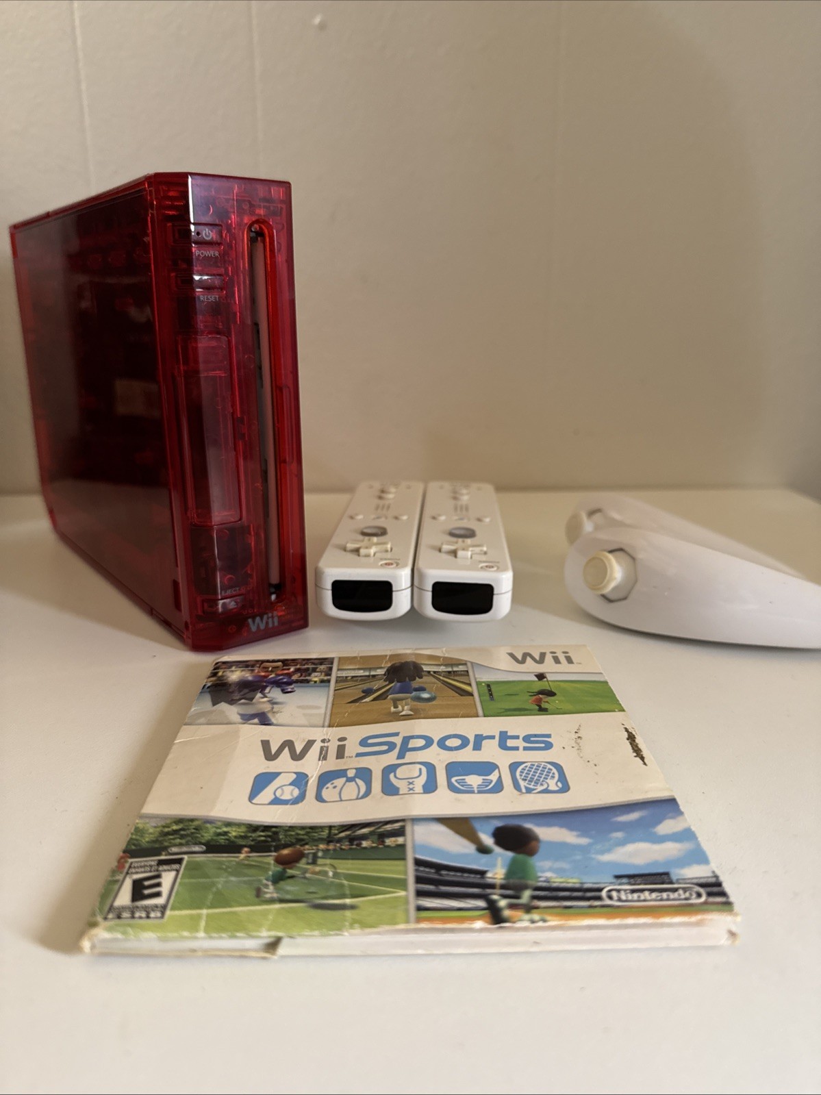 Nintendo Wii Clear Red Console w/ Wii Sports, 2 Wiimote, 2 Nunchuck & Sensor Bar