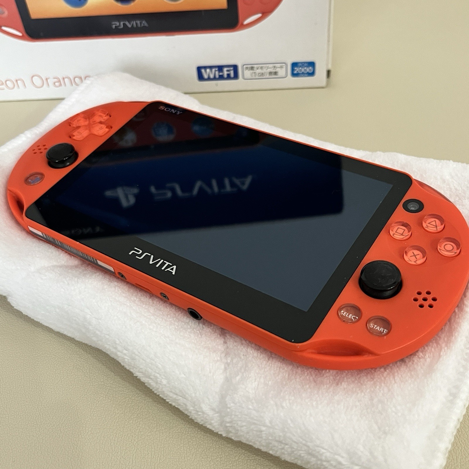 Sony PS Vita PCH-2000 Neon orange with Box + Japanese Import FW 3.68 – SD Adapt