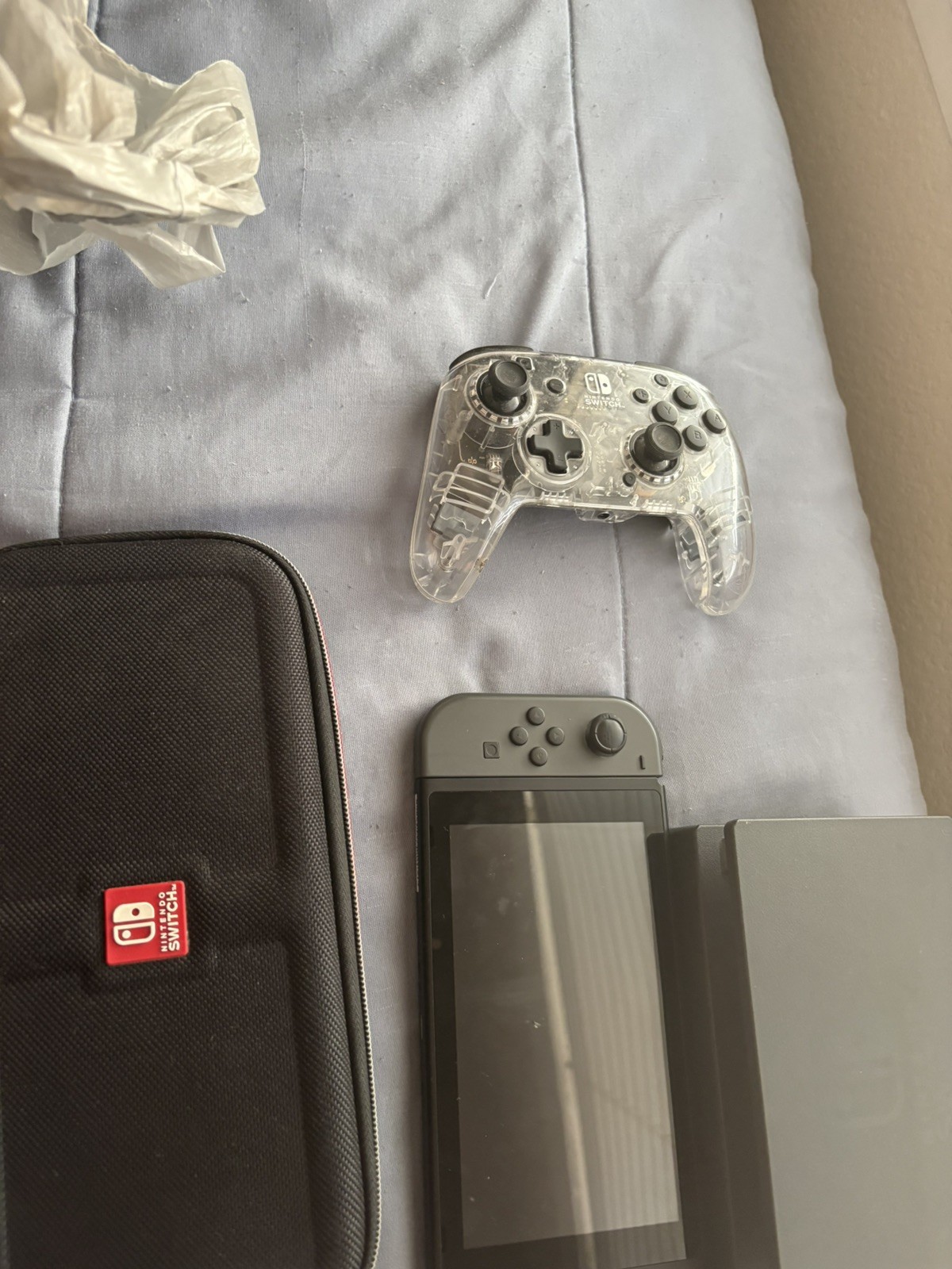 Nintendo Switch Handheld Console Gray Joy-Cons with dock and a case.