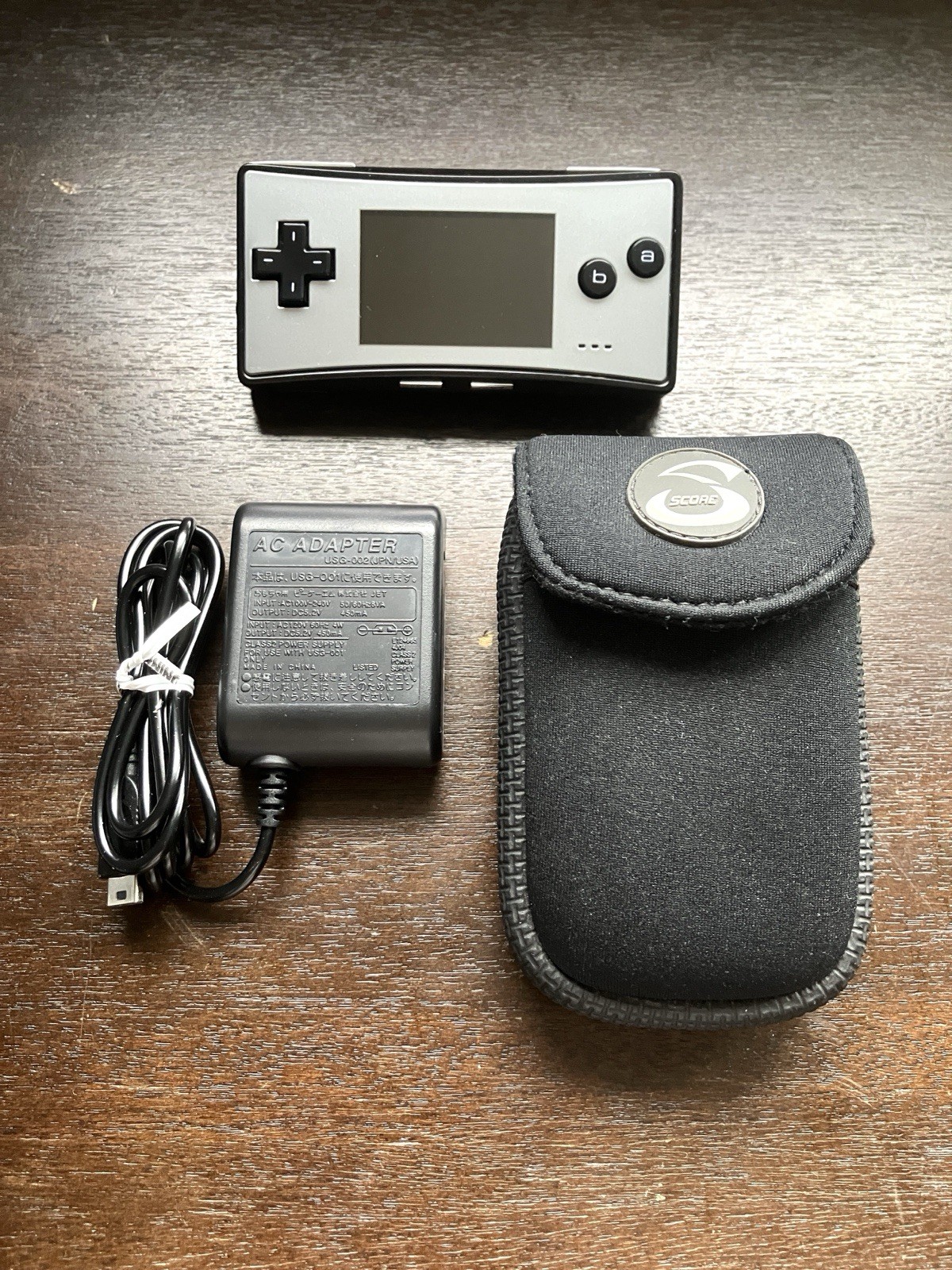 Gameboy Micro – Silver – Near Mint Condition – Tested – w/ Charger and Case