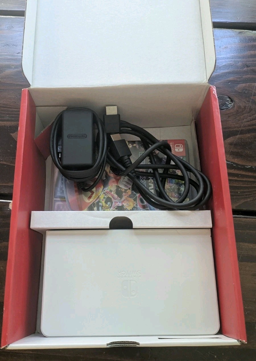 Nintendo Switch OLED Bundle Handheld Console 64GB Plus 2 Mario Games & Dock