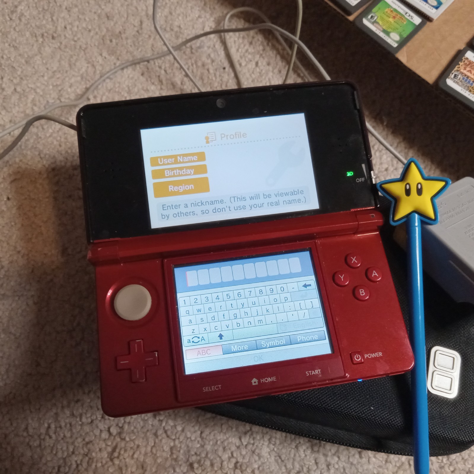 Nintendo 3DS Handheld System, plus 52 games, themed stylus and carrying case
