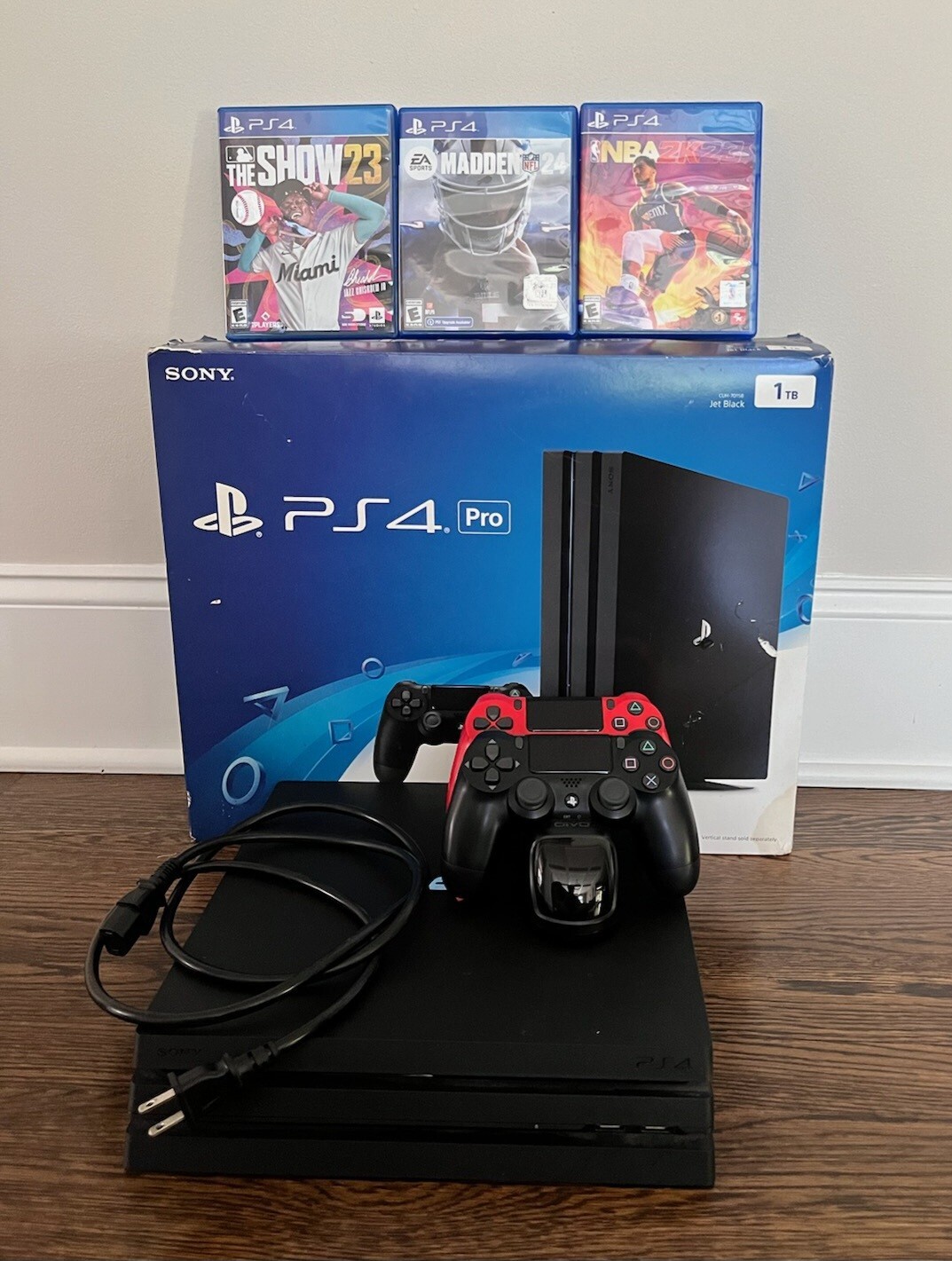 Sony PlayStation 4 Pro 1TB Console – Two Controllers – Games Included