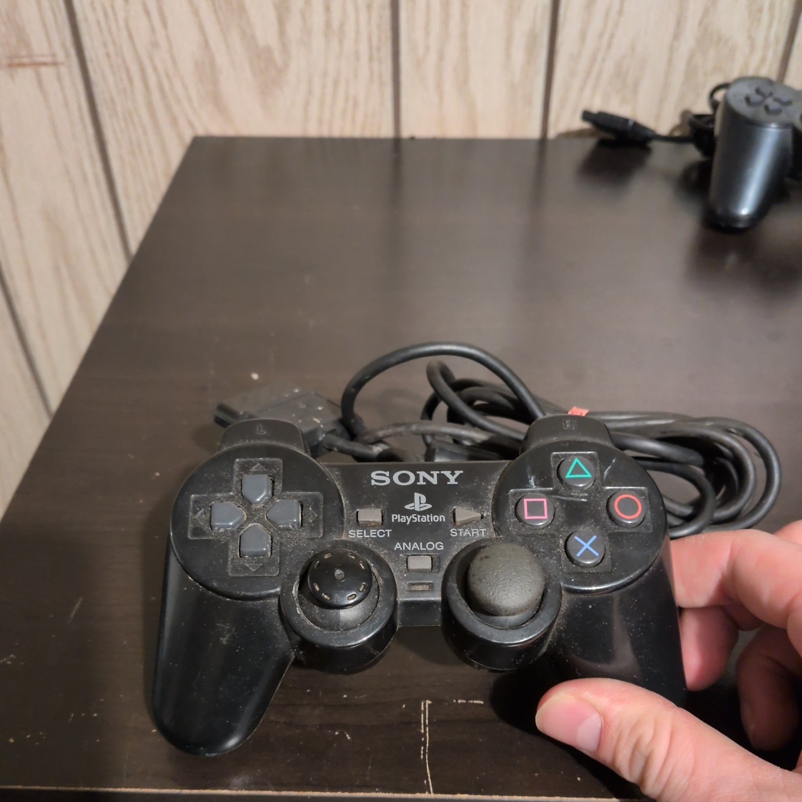 2 Sony PlayStation Consoles (w/Controllers, Cable, & 2 8MB Memory Cards)