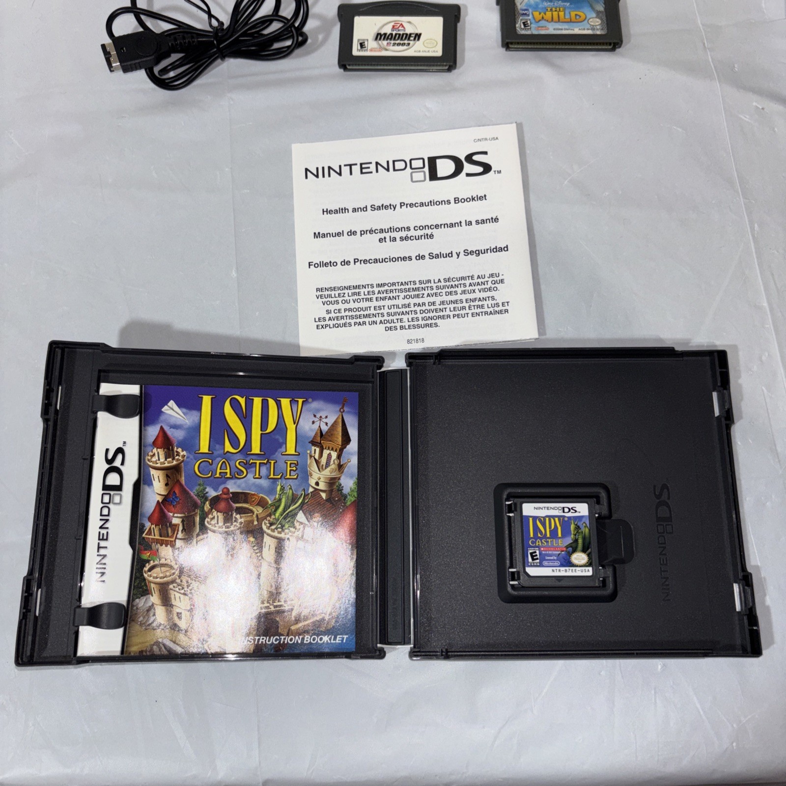 Nintendo DS Silver Handheld System with Wrist Strap + 6 Games Tested and Working