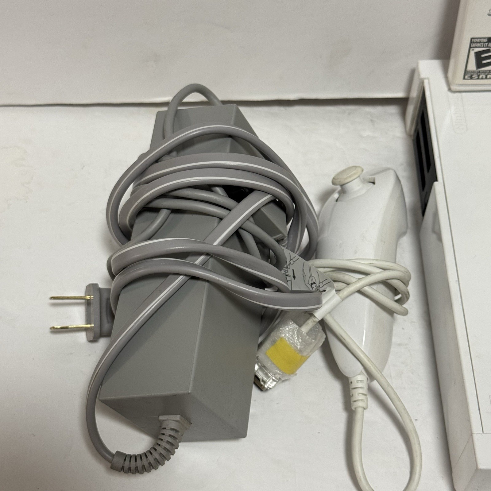 Nintendo RVL-101 Wii Console Bundle – W/ Cords, Nunchuck, And Games