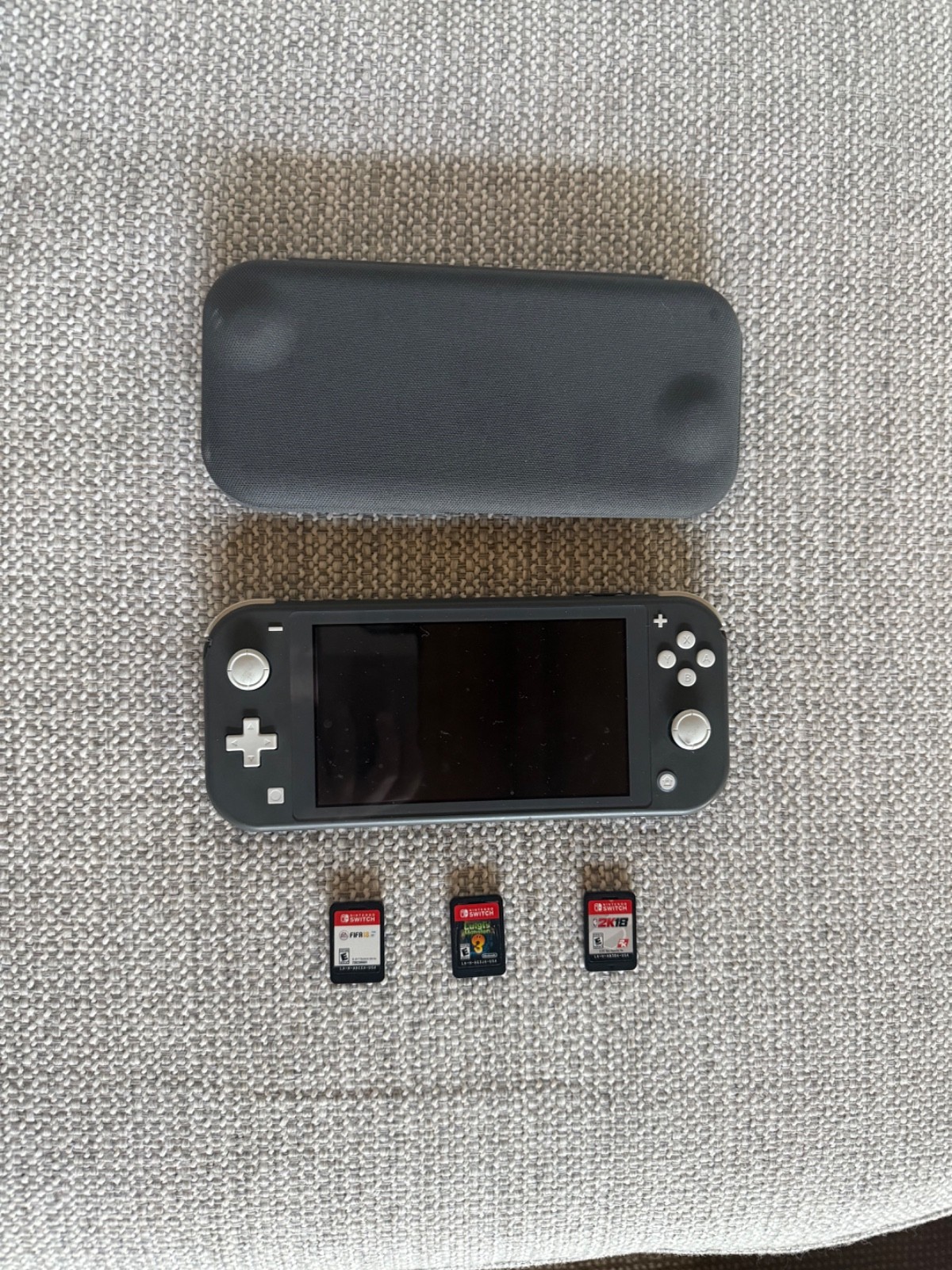 Nintendo Switch Lite Gray Handheld System with protective case