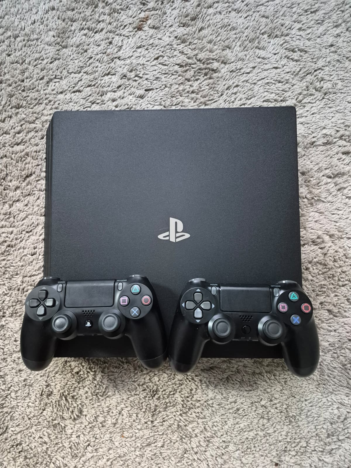 PS4 Pro 1TB with 2 DualShock controllers great condition