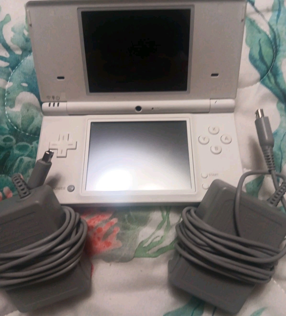 Nintendo DS With 2 Charger Cables, Earphones With Volume Control And Cars Game