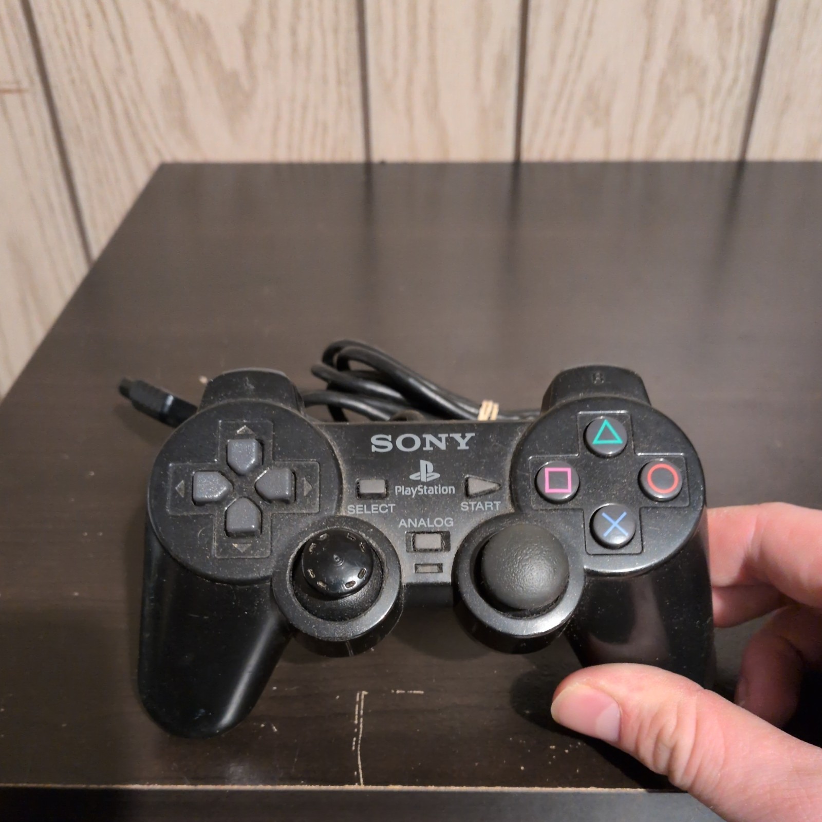 2 Sony PlayStation Consoles (w/Controllers, Cable, & 2 8MB Memory Cards)