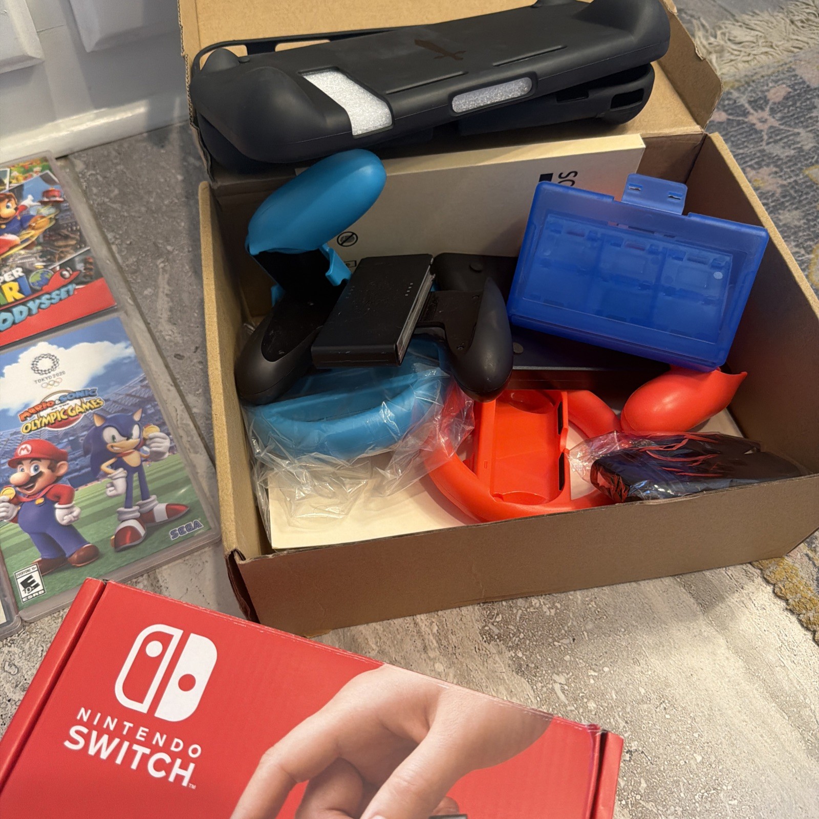 Nintendo Switch OLED BUNDLE 64GB 10 games w 5 Mario games & Comes w/ attachments