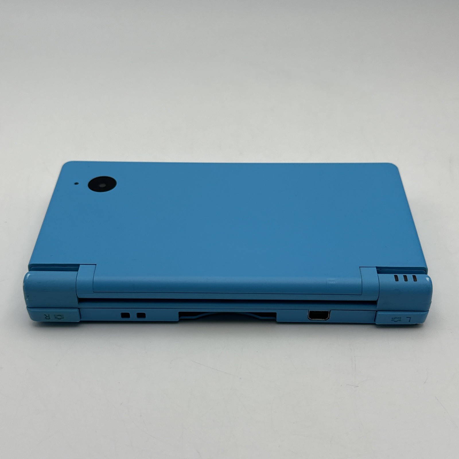 Nintendo DSi Blue Handheld Console C/TWL-USA-1 w/ 4 Games Case Stylus & Charger