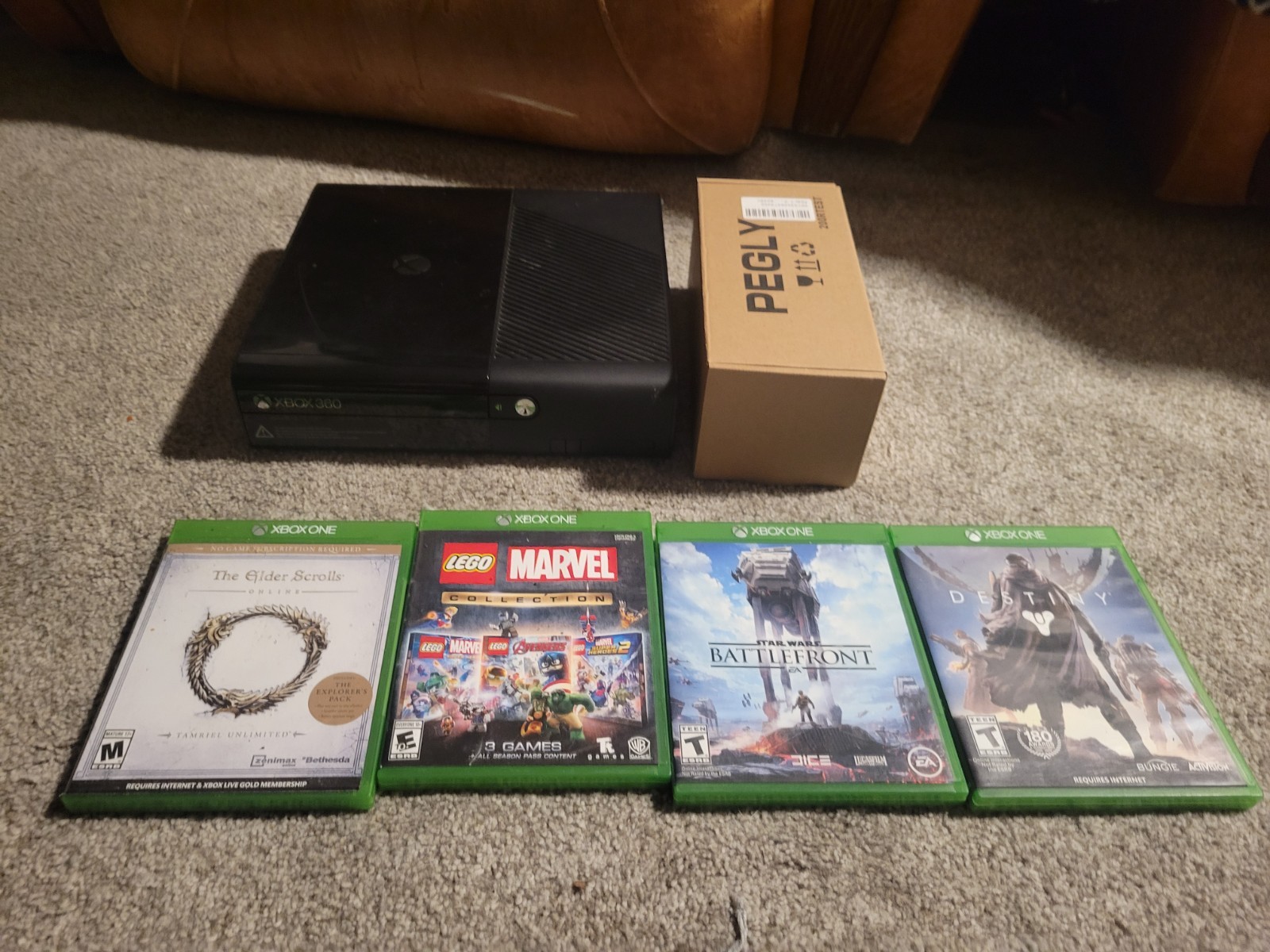 Xbox 360 E Console No Controller with Video Games and Cables Bundle