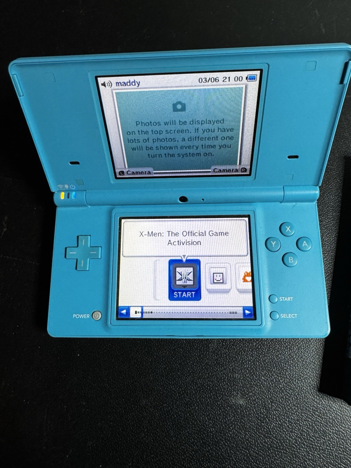 Nintendo DSi Ice Blue Handheld Console System W/ Charger & X-men Nice Condition