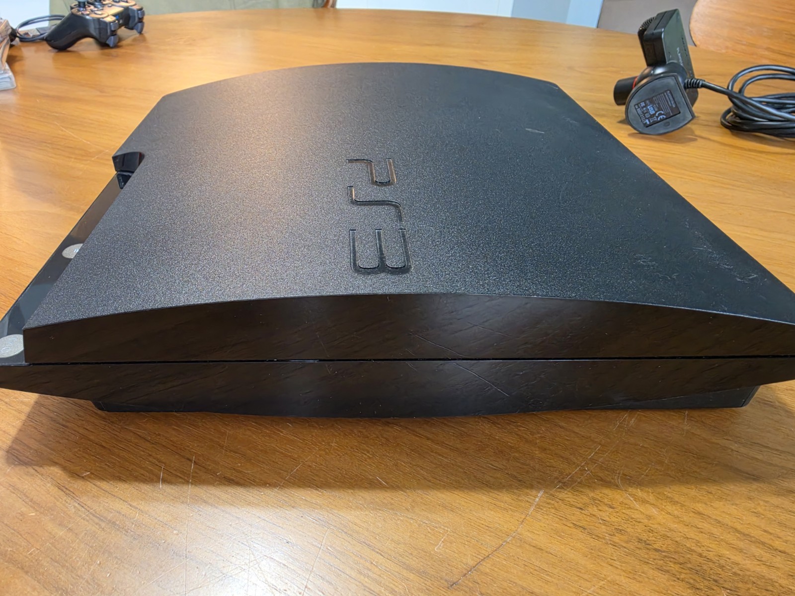 PS3 Bundle. CEHC-2101A System, 11 Games, 2 Controllers, 2 Wands, & PS Eye Camera