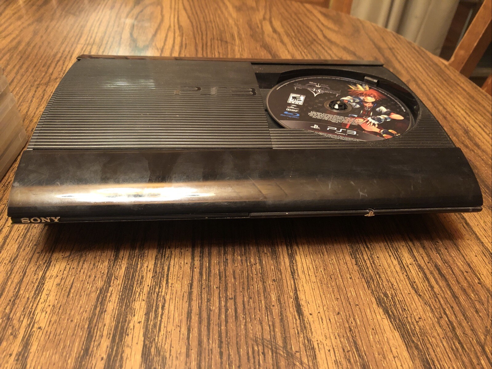 Sony PlayStation 3 Console – Charcoal Black With 10 Games And 2 Controllers