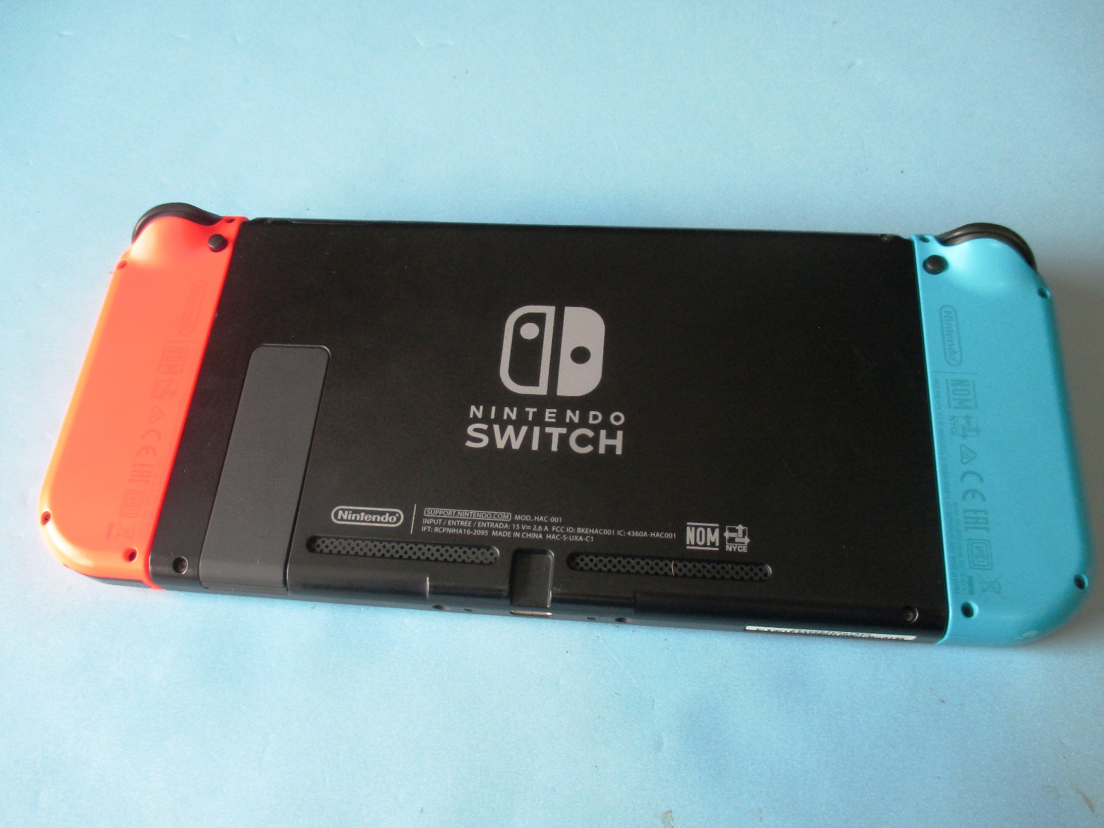 Nintendo Switch System Console w/Neon Red & Blue Joy-Cons + Dock & Extras