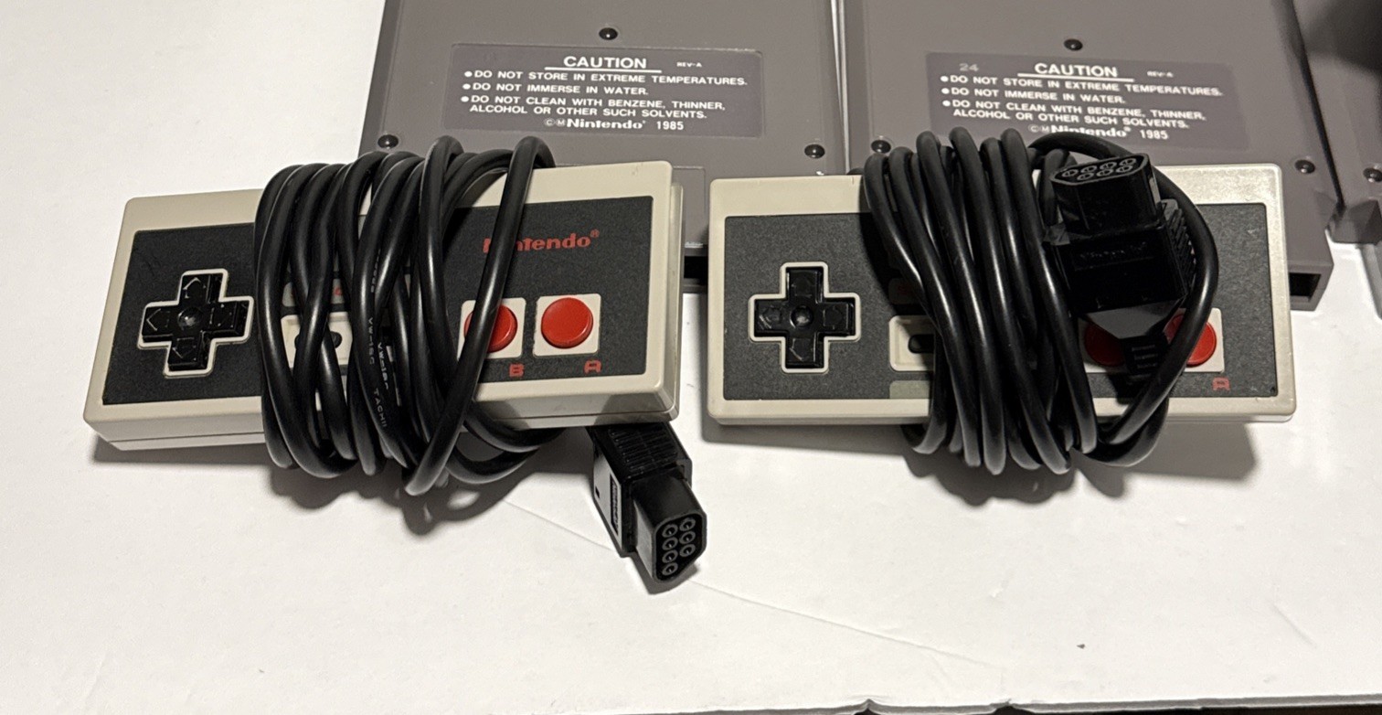 Nintendo NES Console Bundle with 8 Games, 2 Controllers – Tested & Working